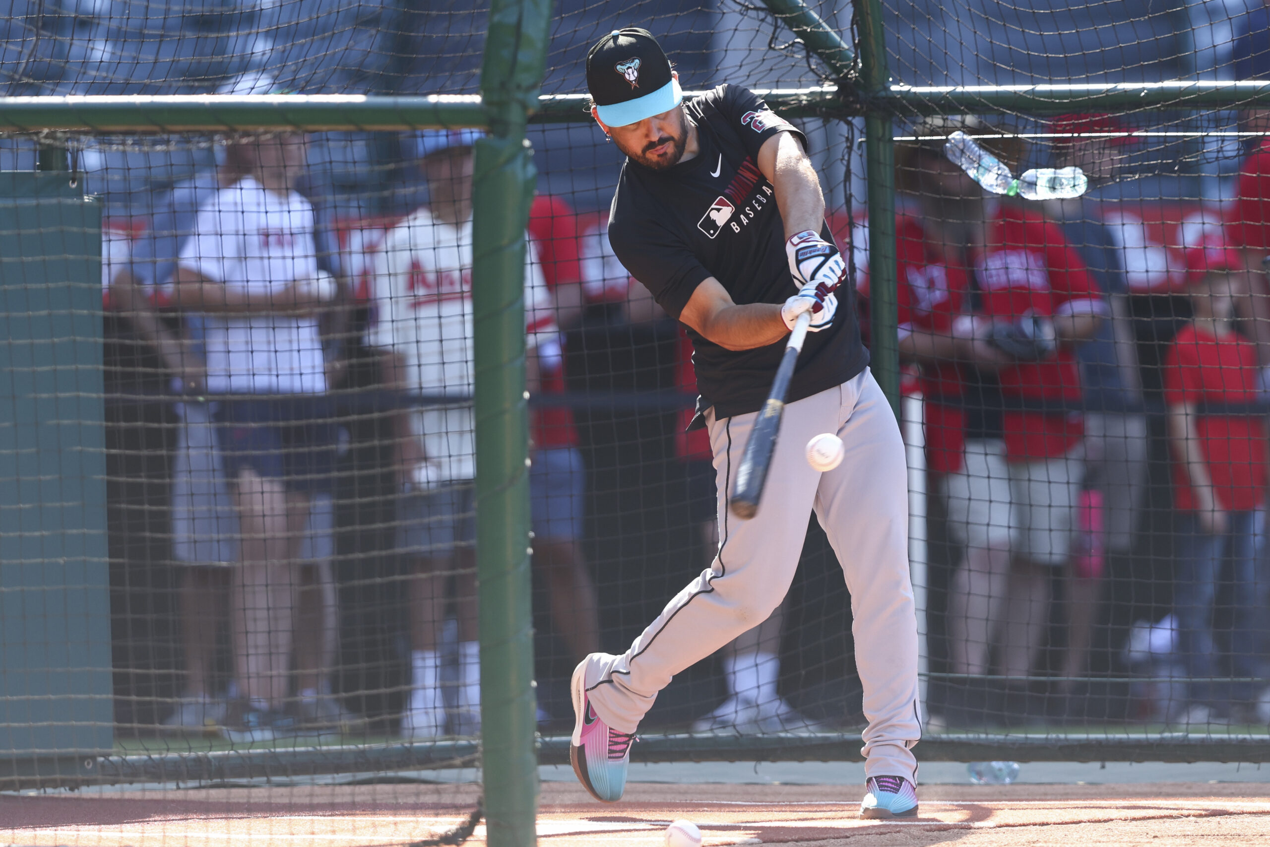 Arizona Diamondbacks’ Eugenio Suárez stands in the cage during batting...