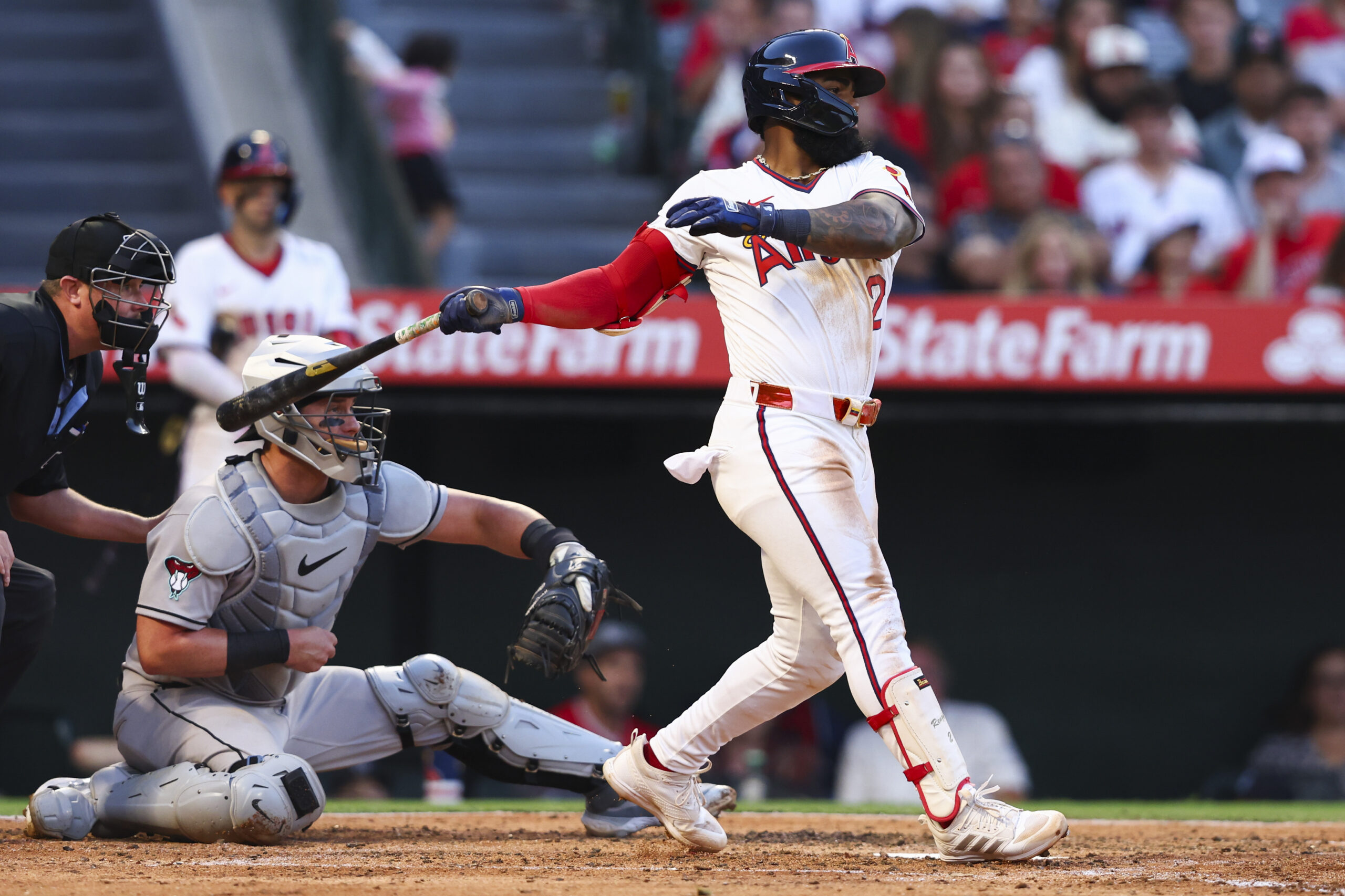 Angels’ Luis Rengifo follows through on an RBI single during...