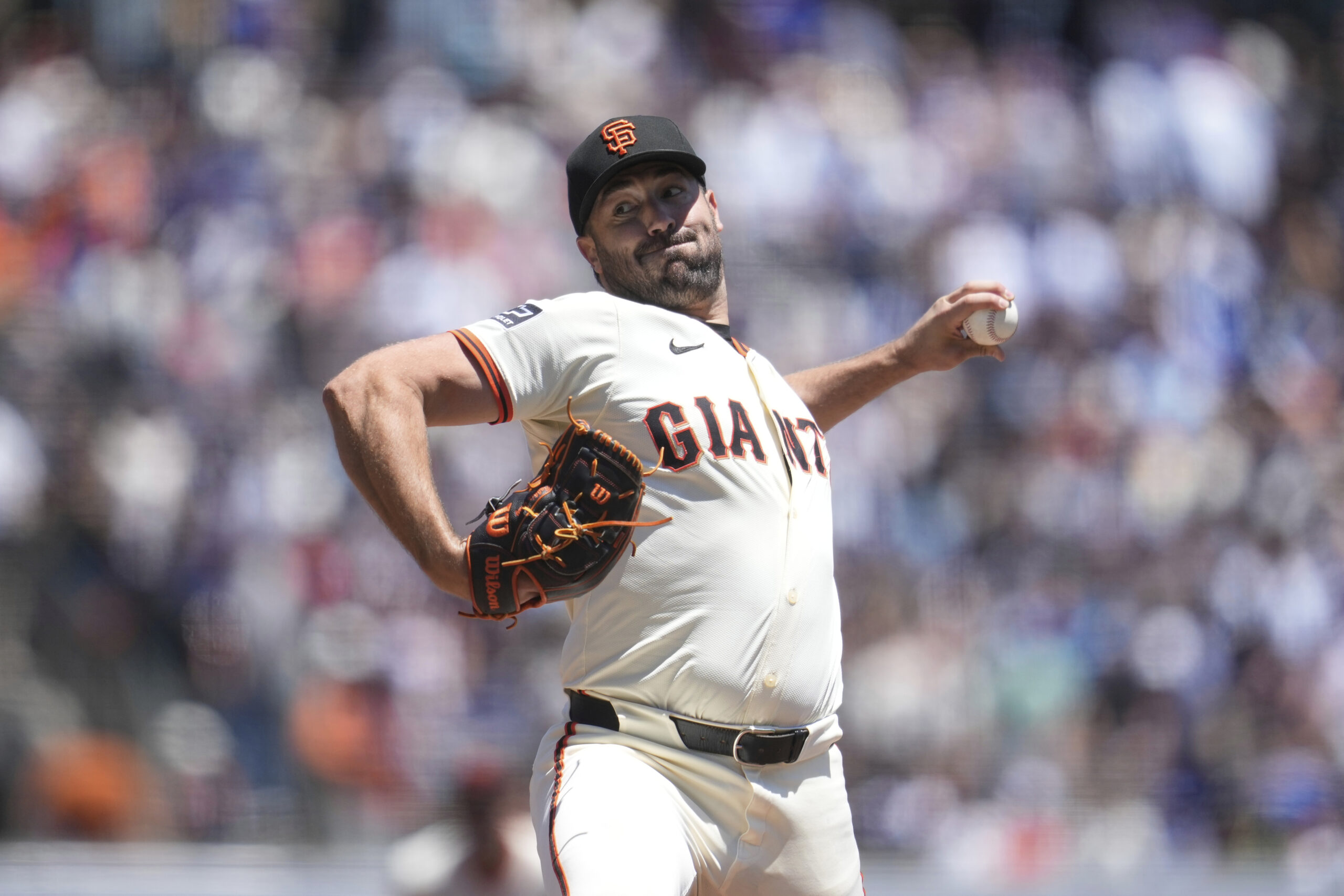 San Francisco Giants pitcher Robbie Ray throws against the Dodgers...