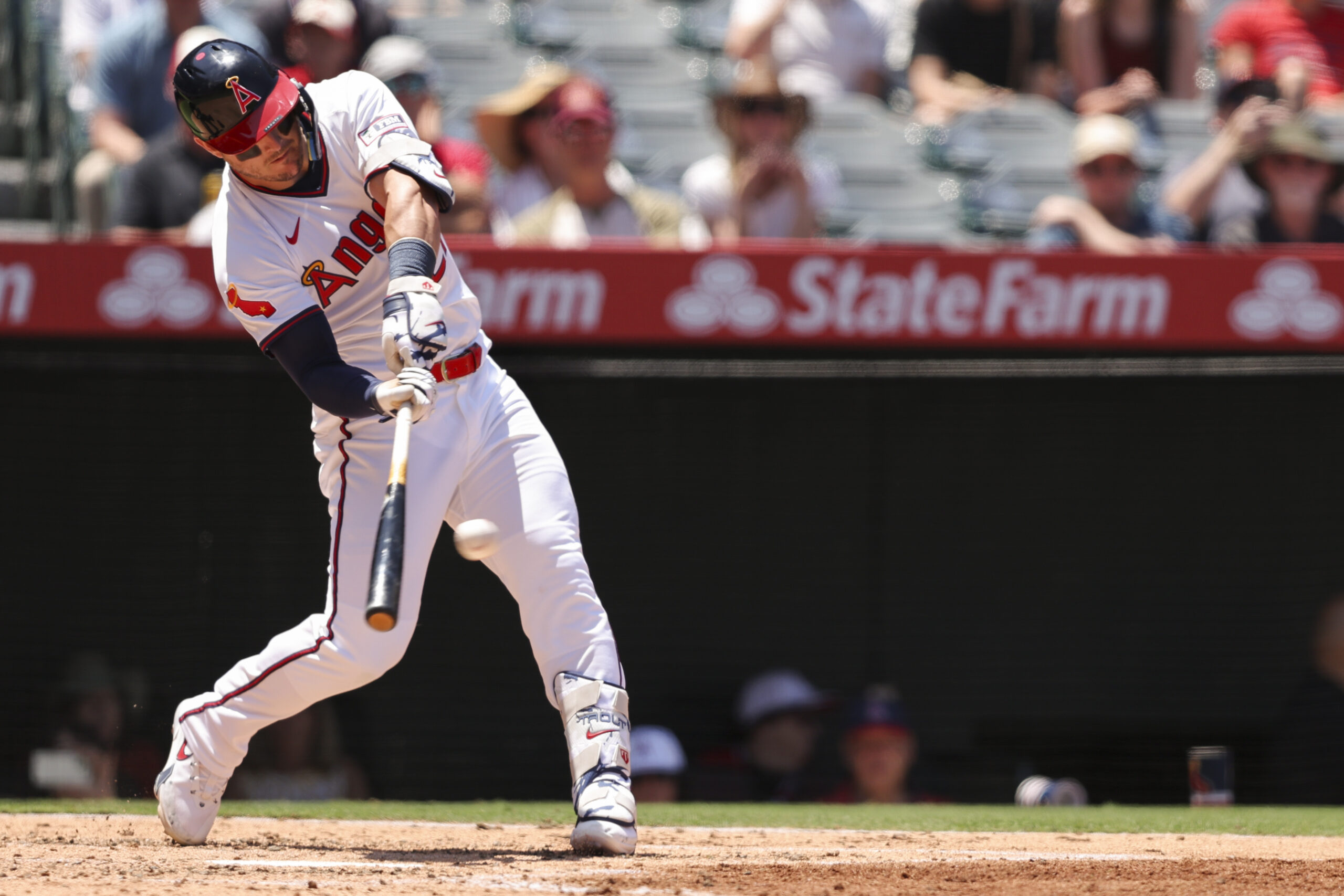 Los Angeles Angels’ Mike Trout hits an RBI single during...