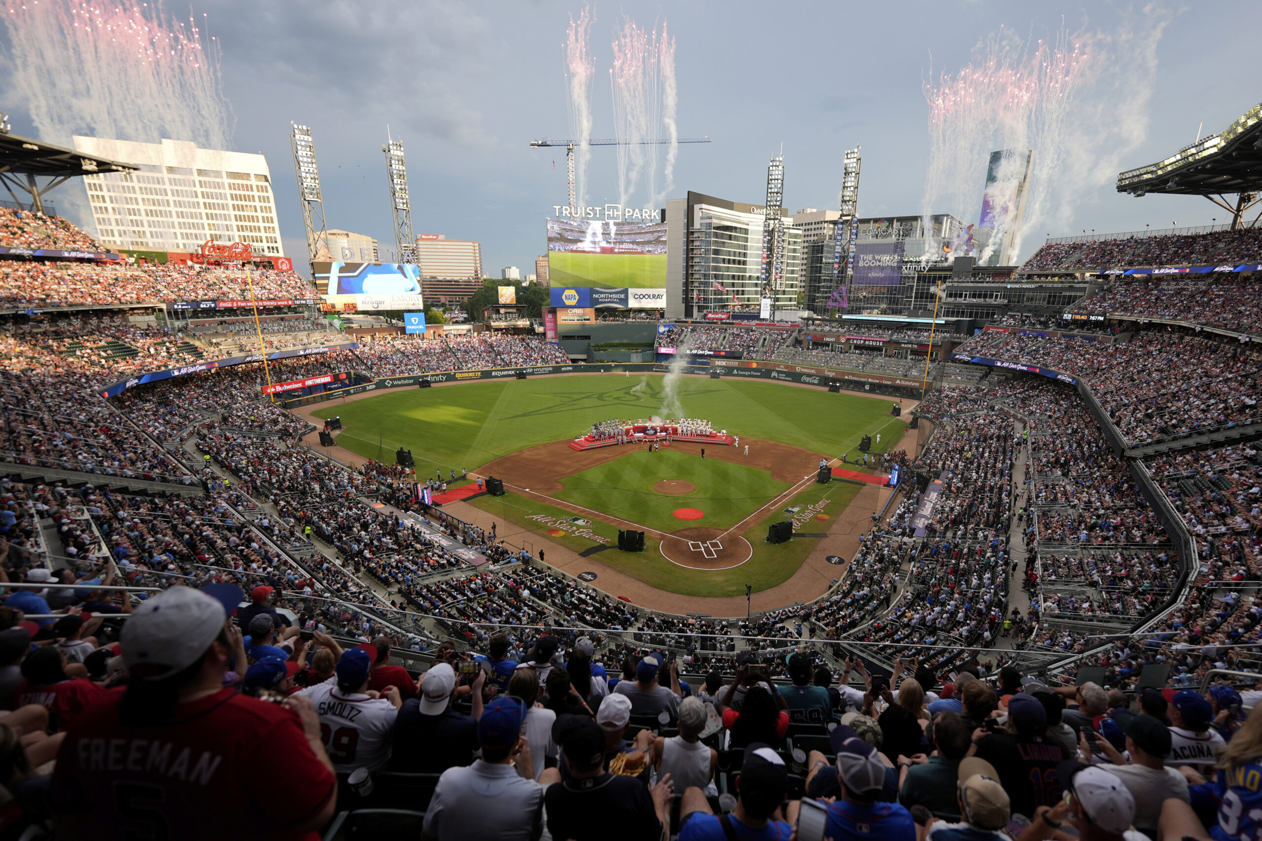 Teams pose before the MLB baseball All-Star game between the...