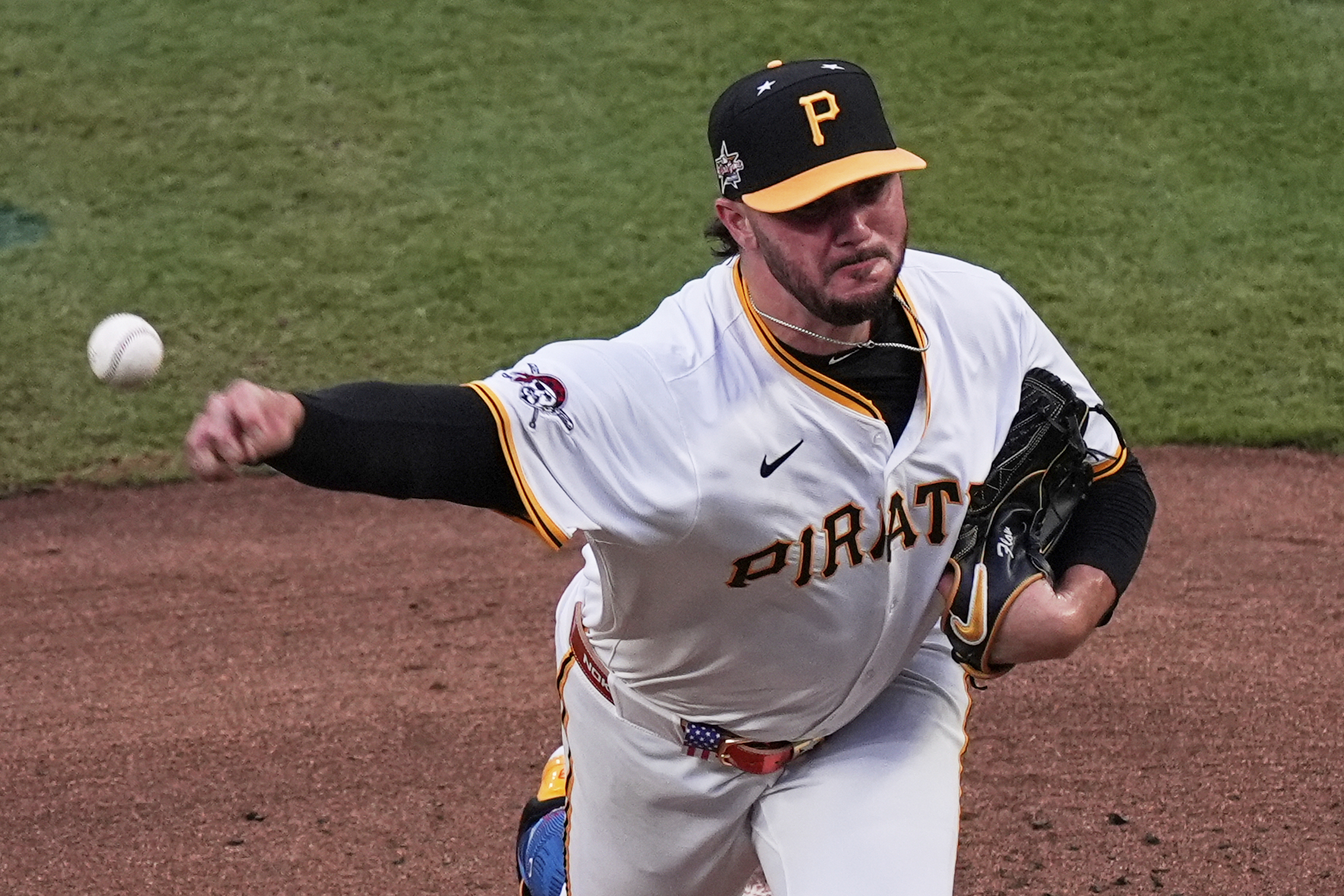 Pittsburgh Pirates pitcher Paul Skenes throws during first inning at...
