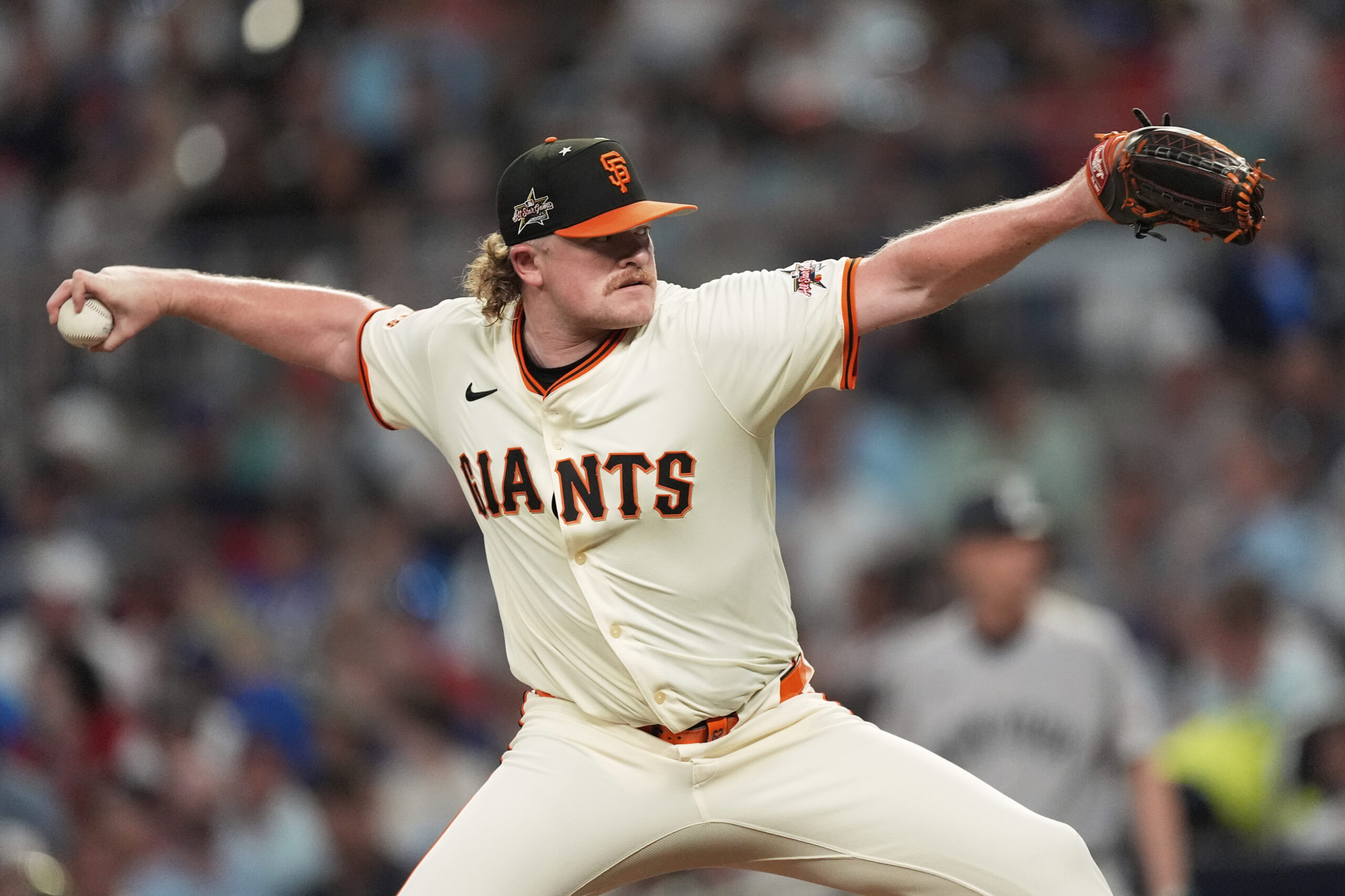 San Francisco Giants pitcher Logan Webb throw during third inning...