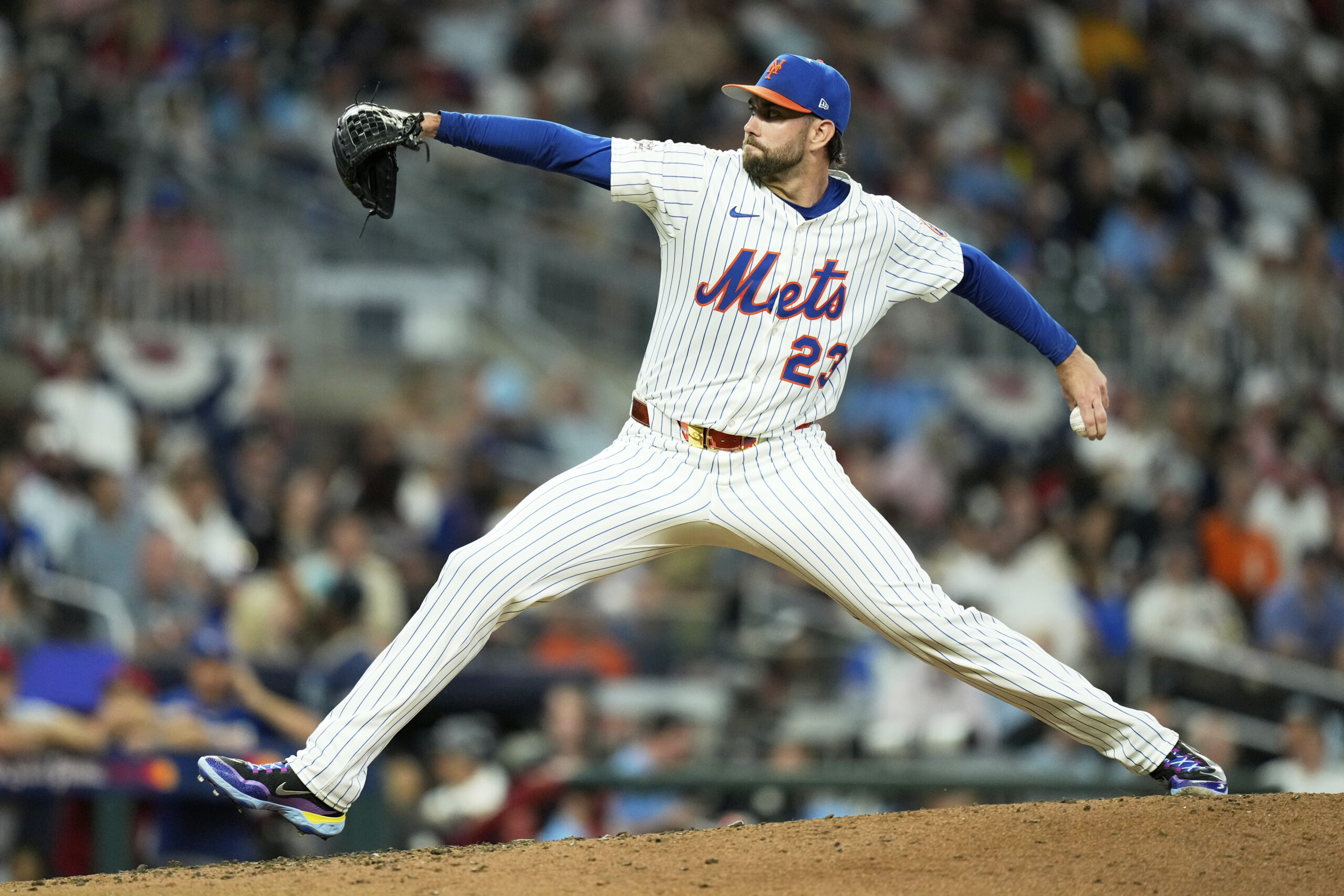 New York Mets pitcher David Peterson throws during the fourth...