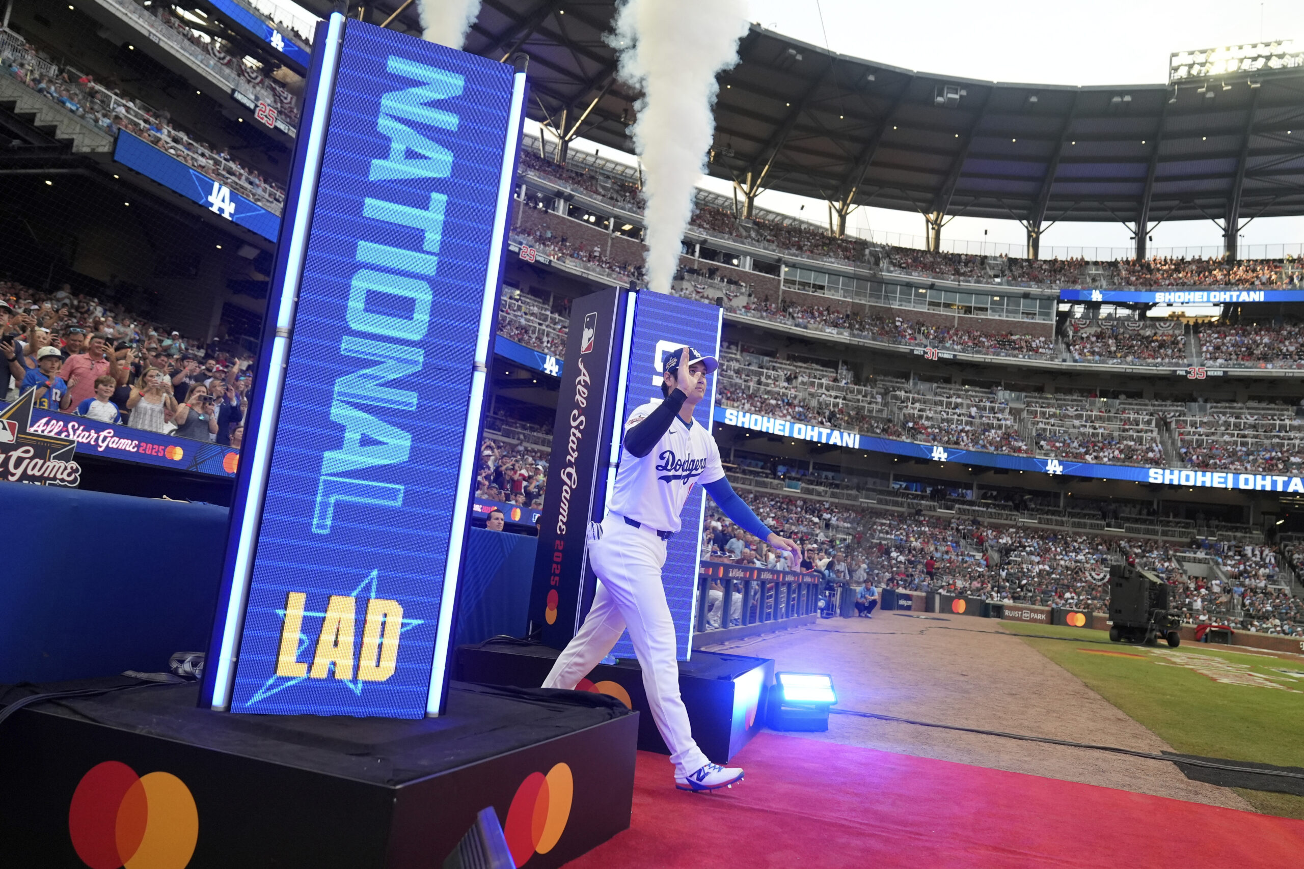 The Dodgers’ Shohei Ohtani arrives at the MLB baseball All-Star...