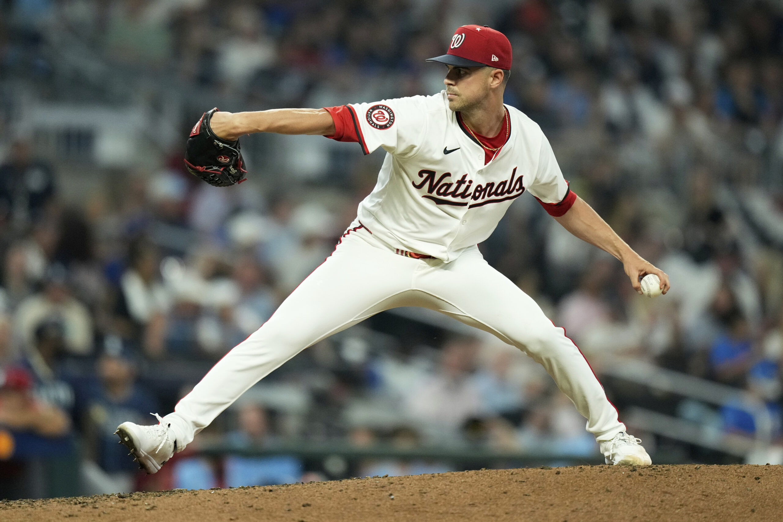 Washington Nationals pitcher MacKenzie Gore throws during the fifth inning...