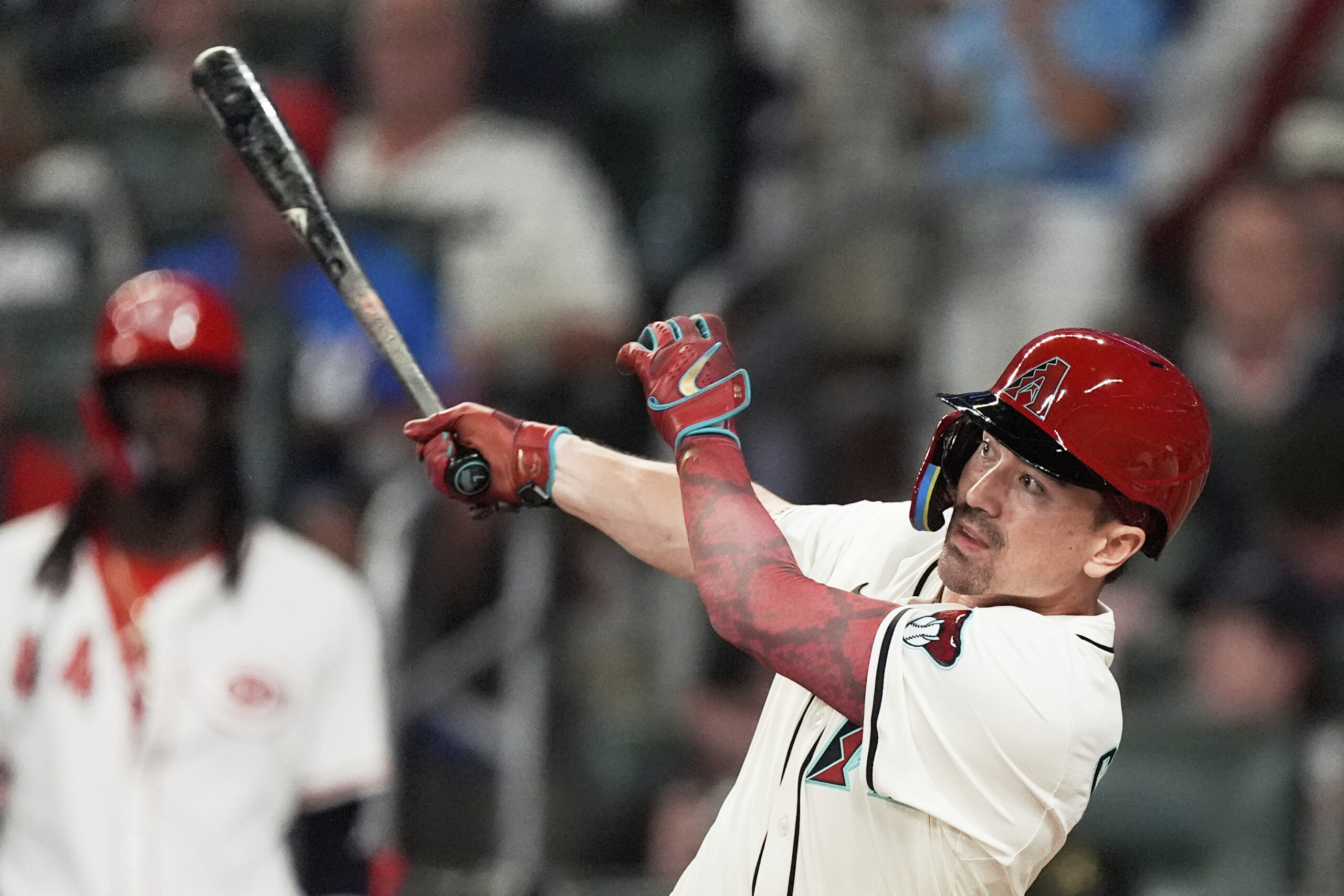 The Arizona Diamondbacks’ Corbin Carroll watched his solo home run...