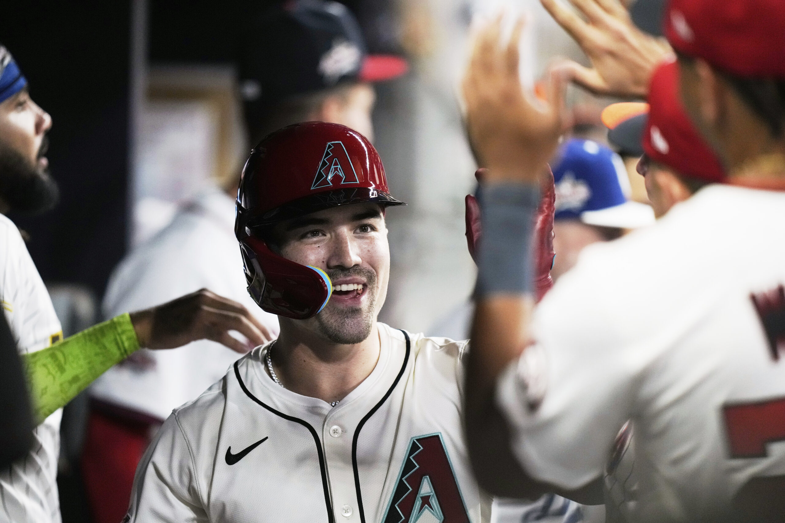 The Arizona Diamondbacks’ Corbin Carroll celebrates his solo home run...