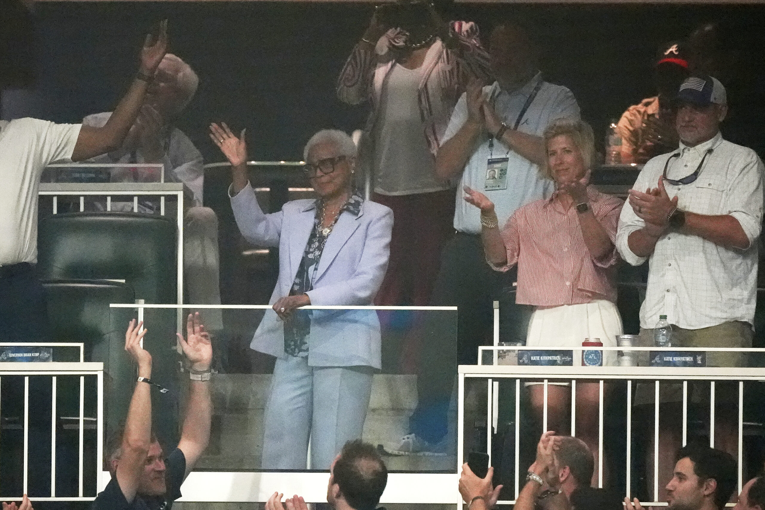 Billye Aaron, wife of baseball great Hank Aaron waves during...