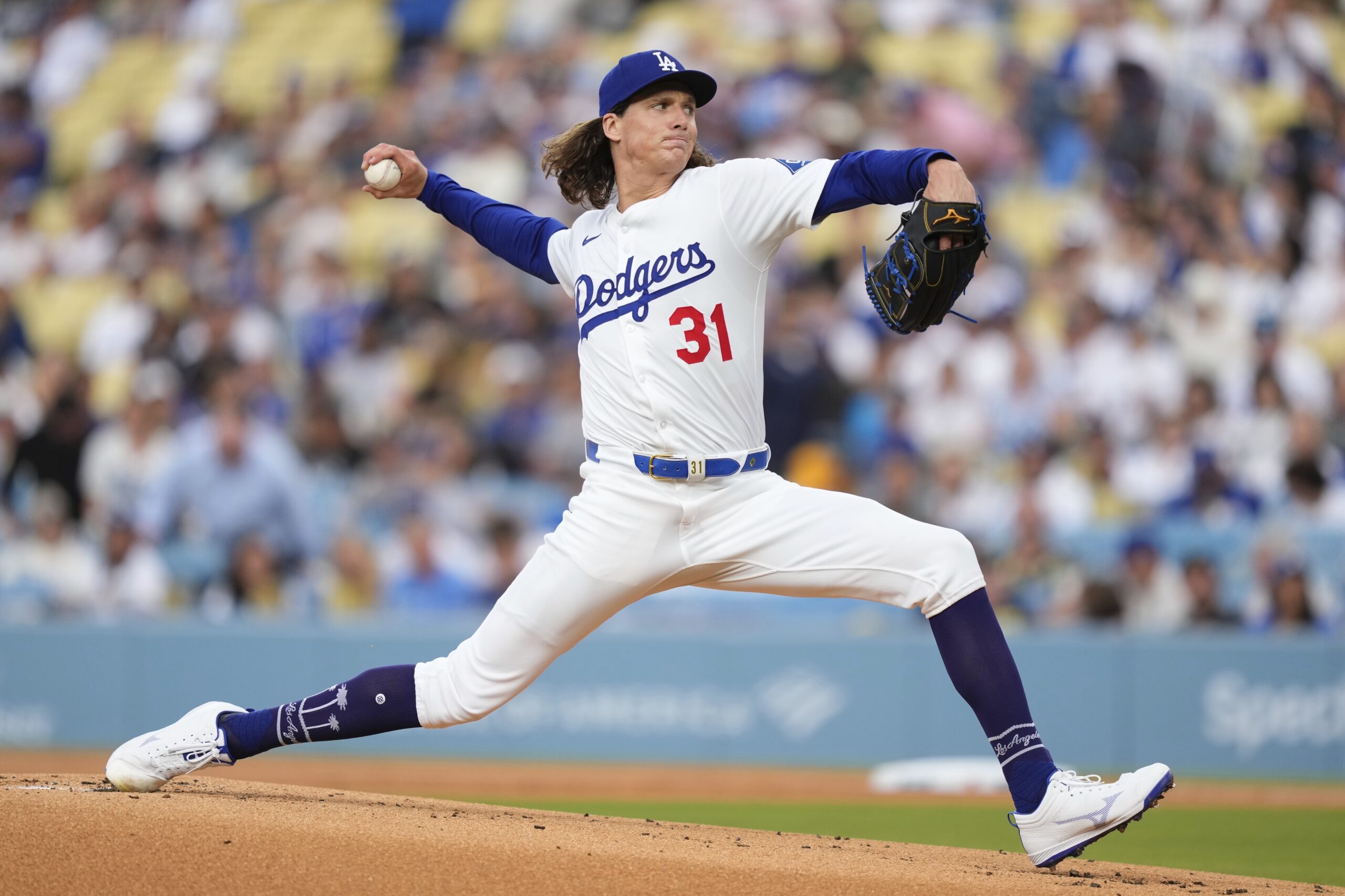 Dodgers starting pitcher Tyler Glasnow throws to the plate during...