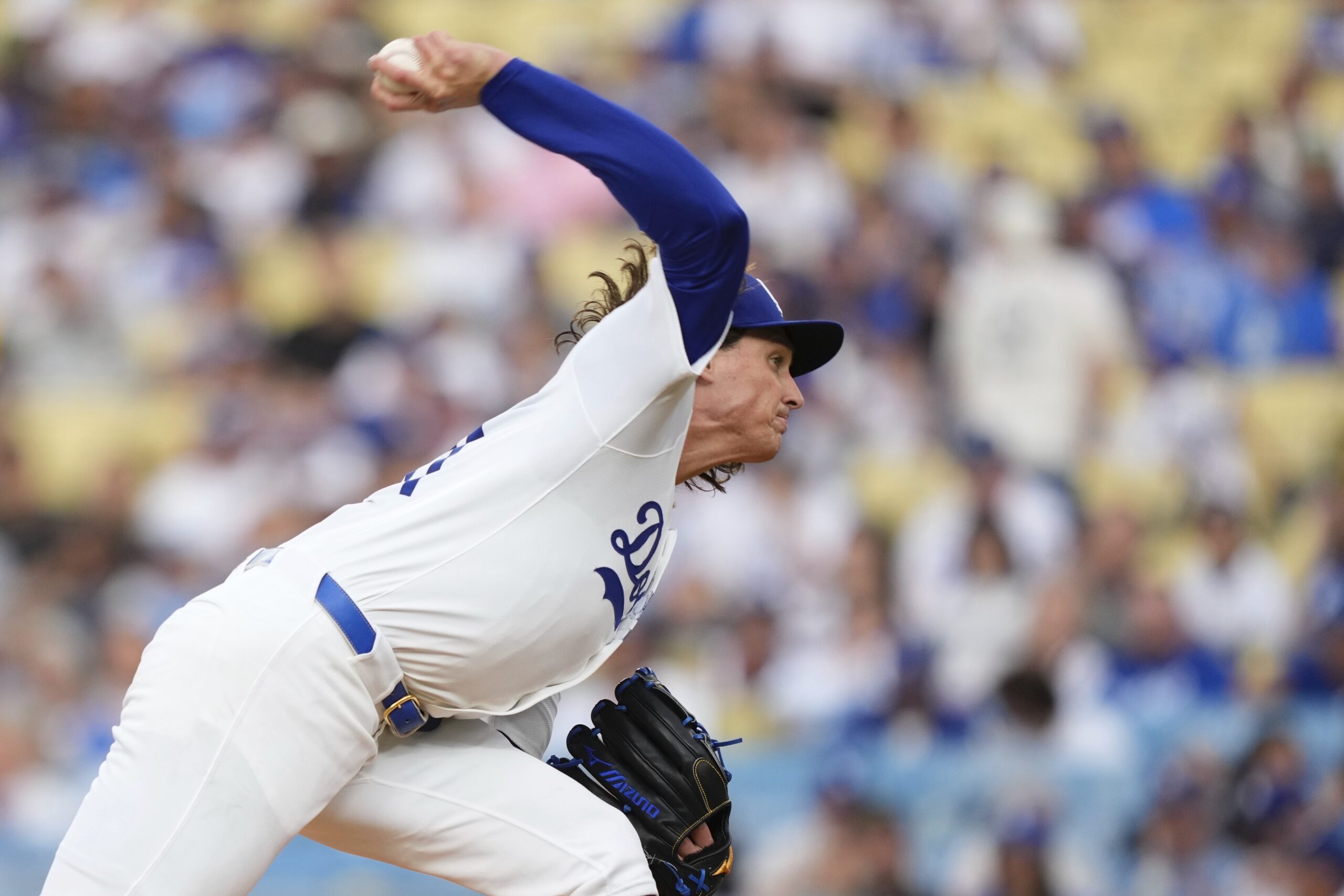 Dodgers starting pitcher Tyler Glasnow throws to the plate during...