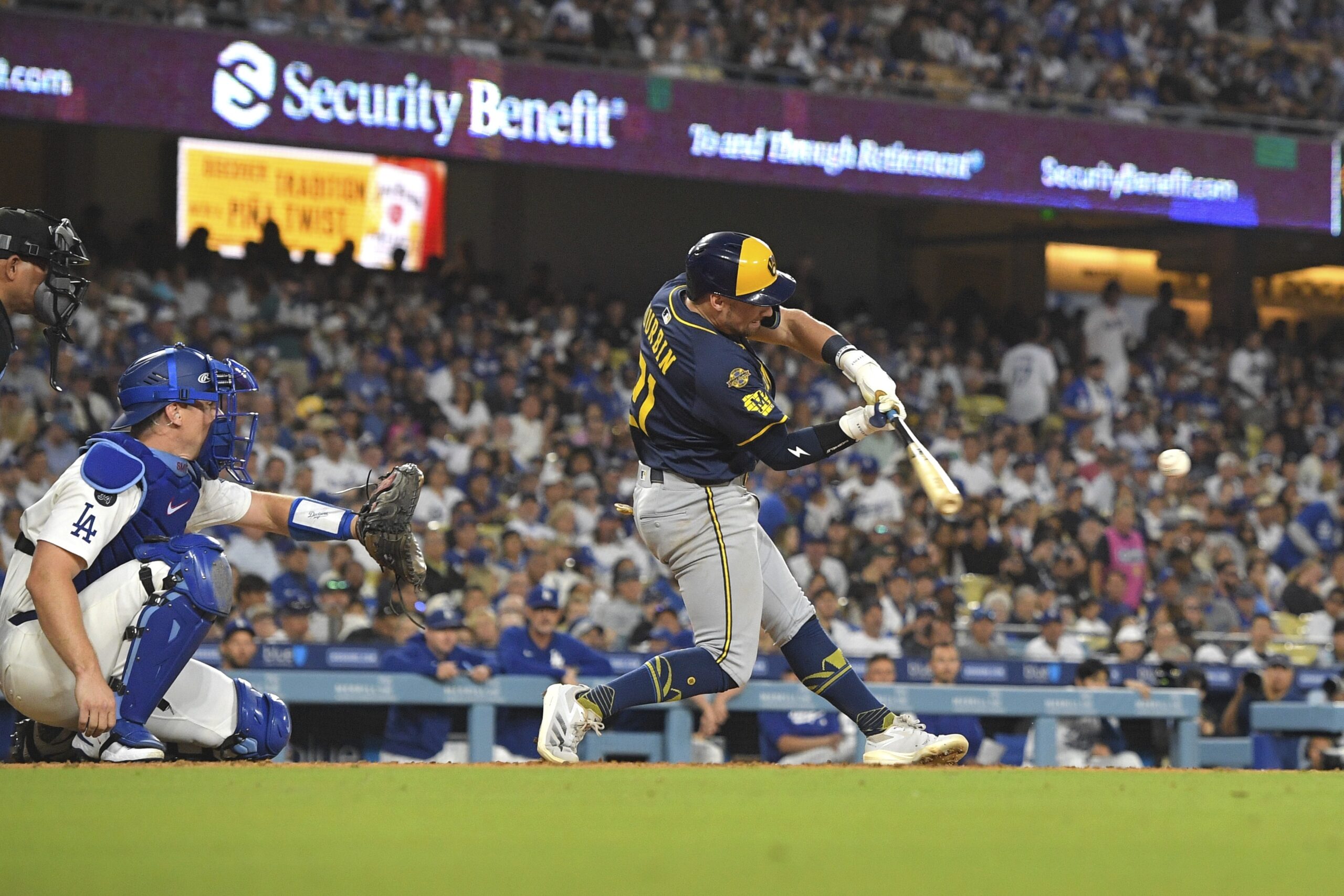 The Milwaukee Brewers’ Caleb Durbin hits an RBI double during...