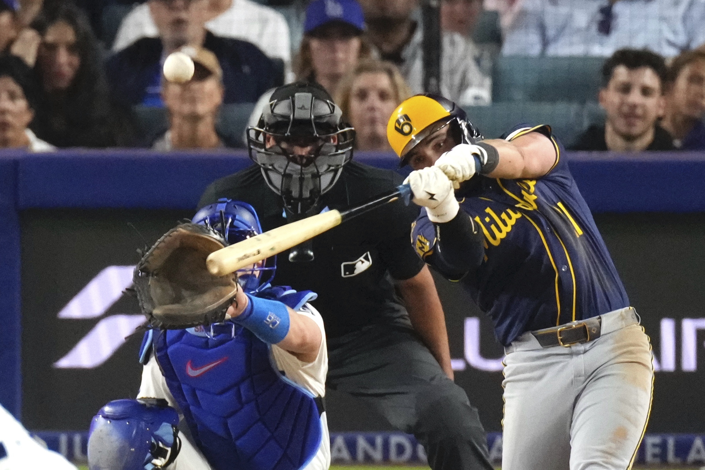 The Milwaukee Brewers’ Caleb Durbin hits a solo home run...