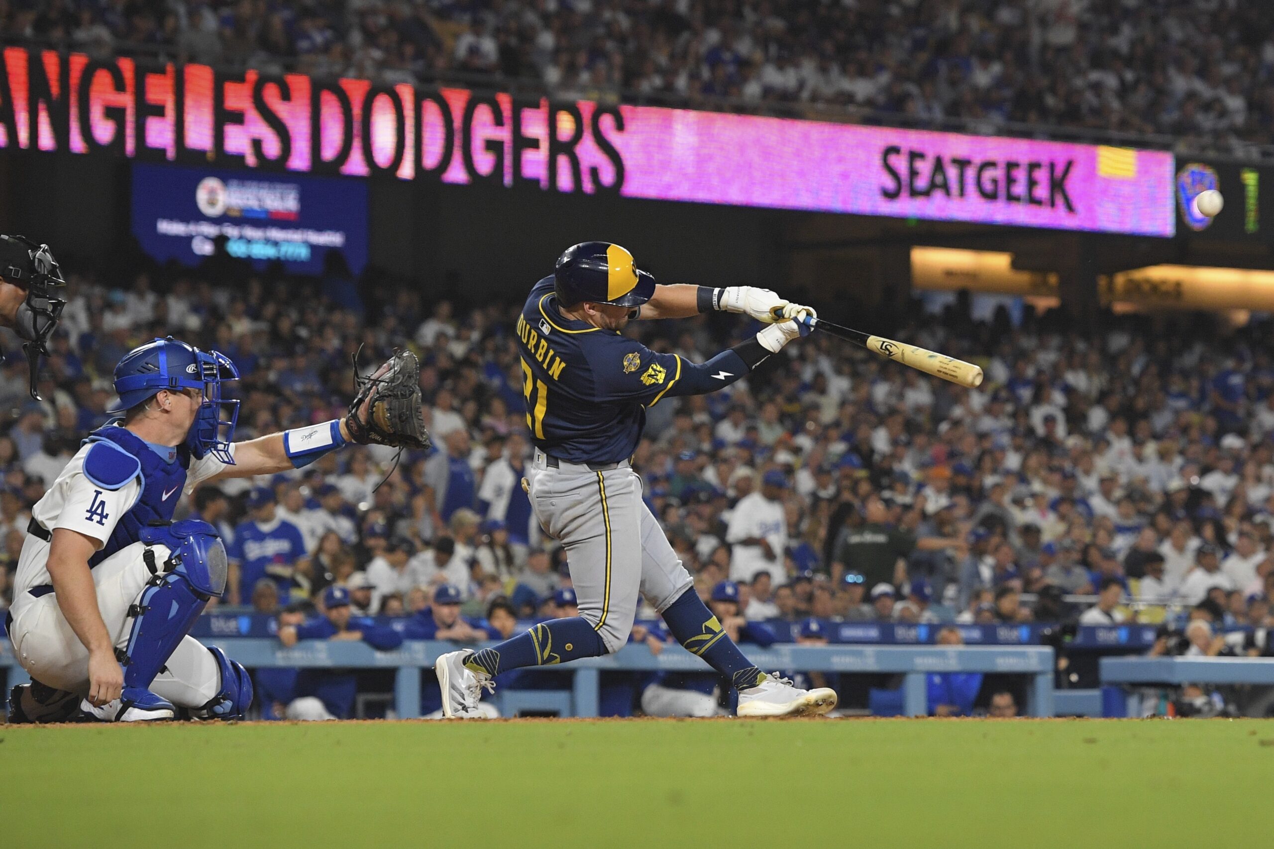 The Milwaukee Brewers’ Caleb Durbin hits a solo home run...