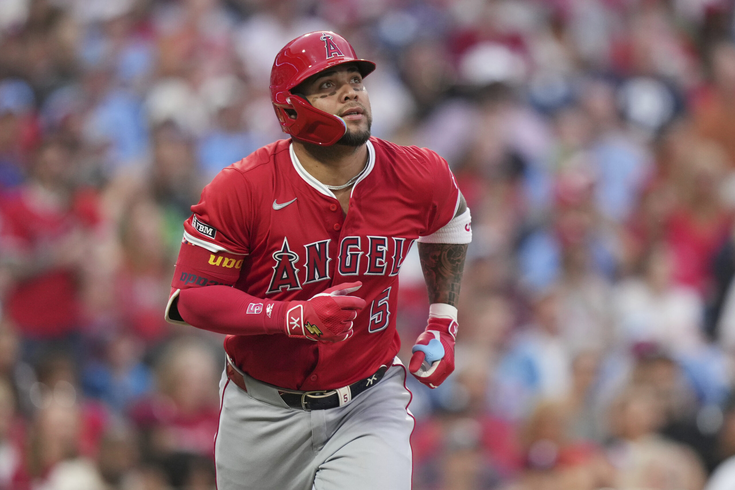 Angels’ Yoán Moncada runs after hitting a home run against...