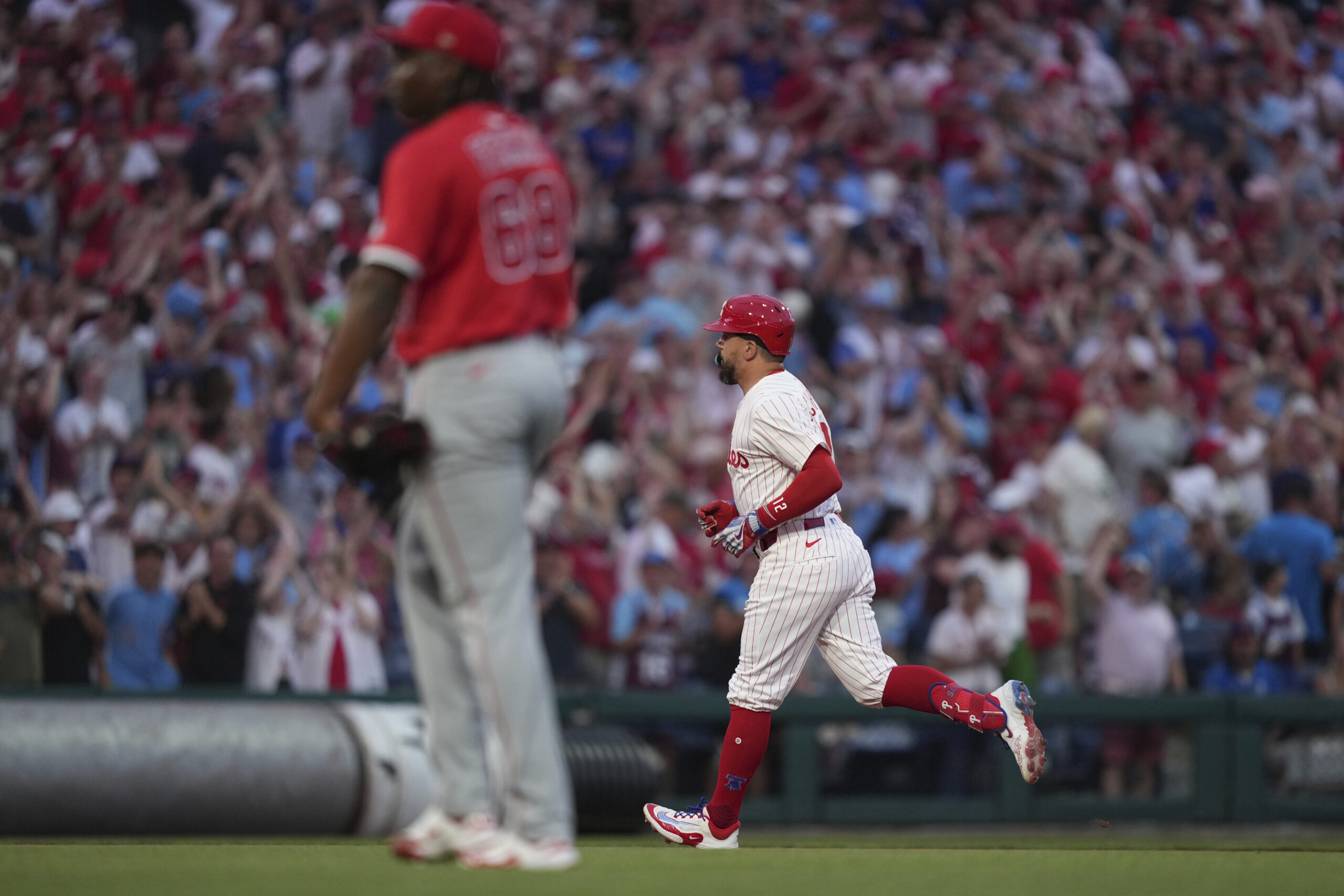 Philadelphia Phillies’ Kyle Schwarber reacts after a grand slam during...