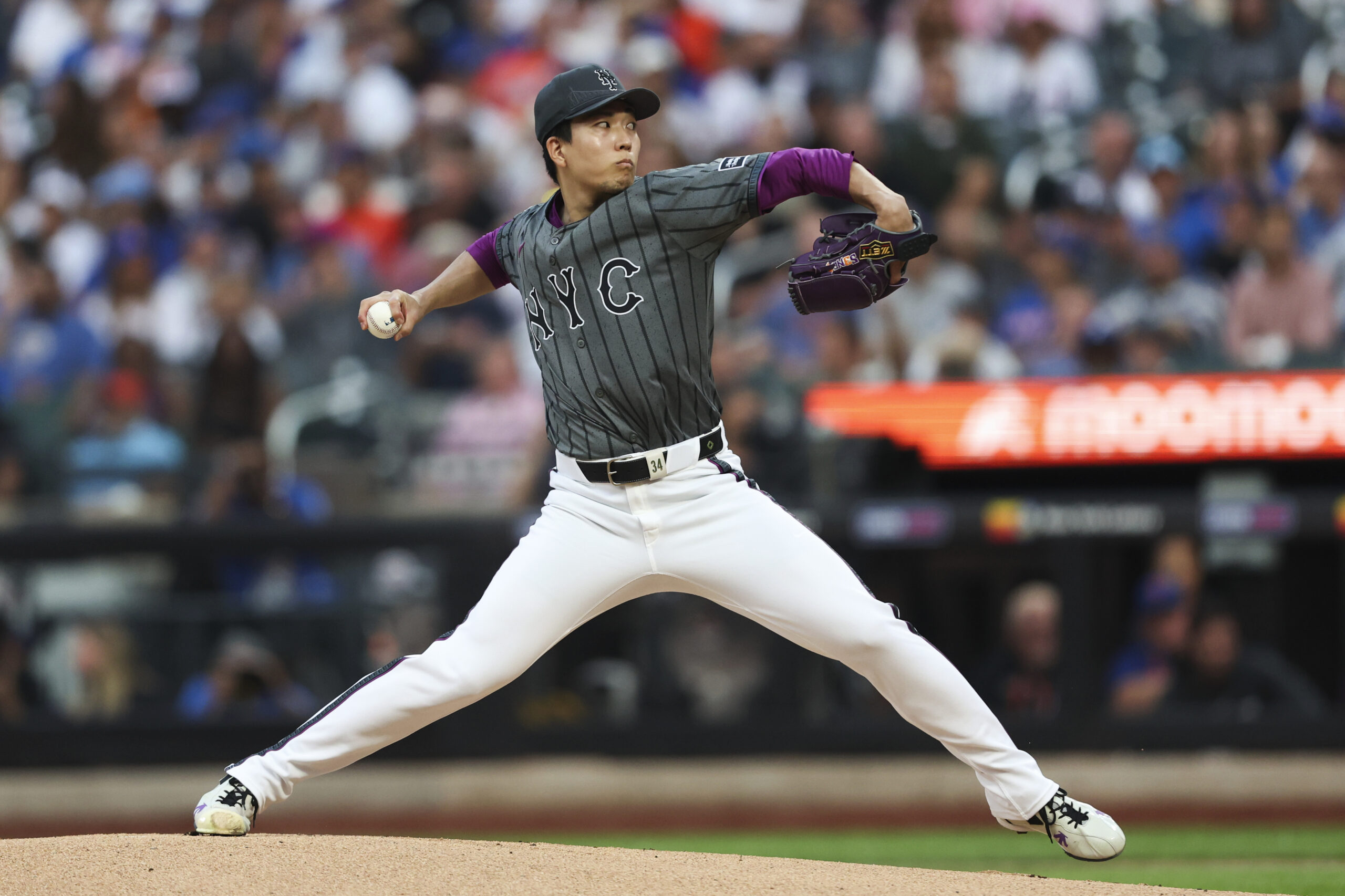 New York Mets starting pitcher Kodai Senga throws to the...
