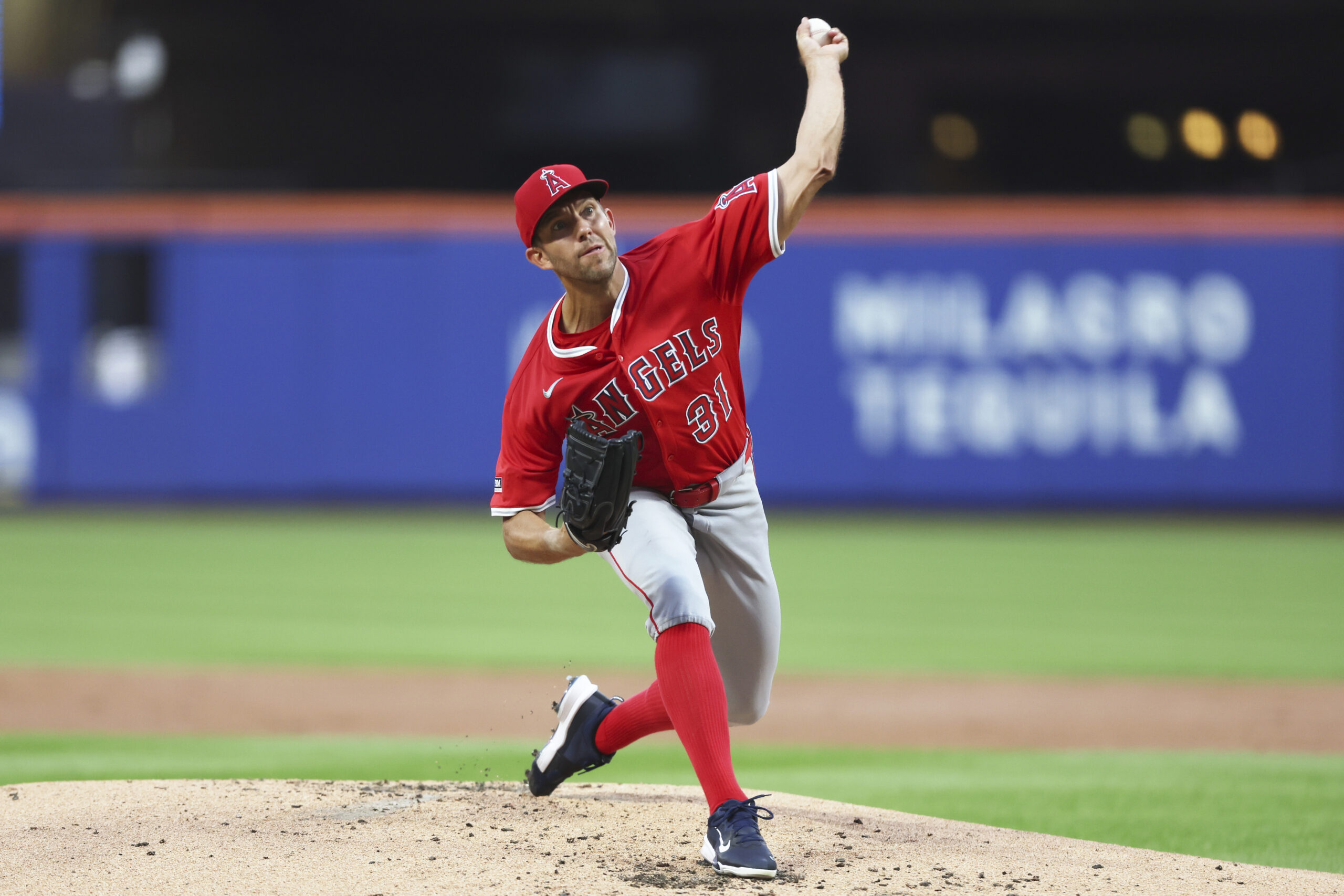 Angels starting pitcher Tyler Anderson throws to the plate during...