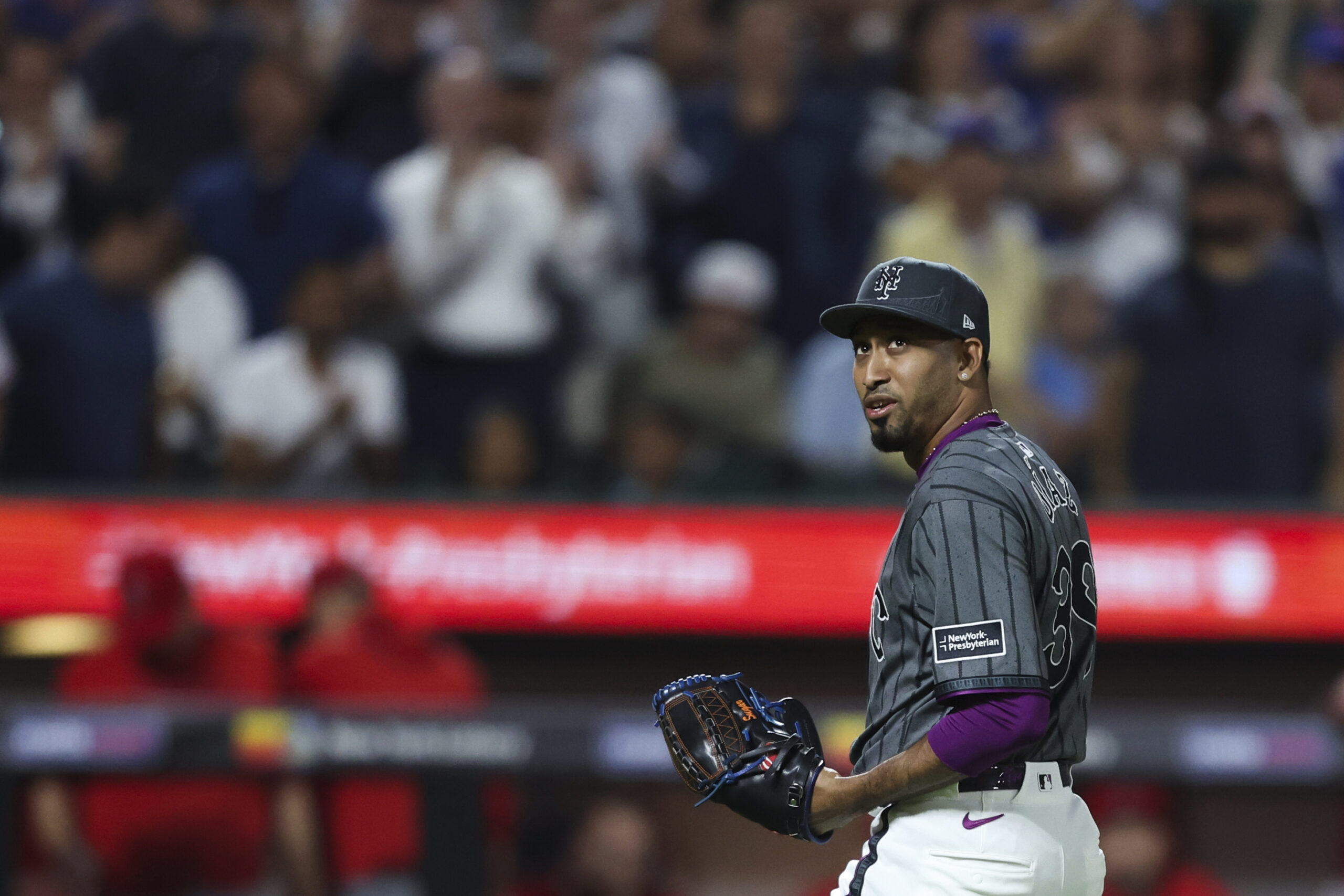 New York Mets relief pitcher Edwin Díaz celebrates after the...