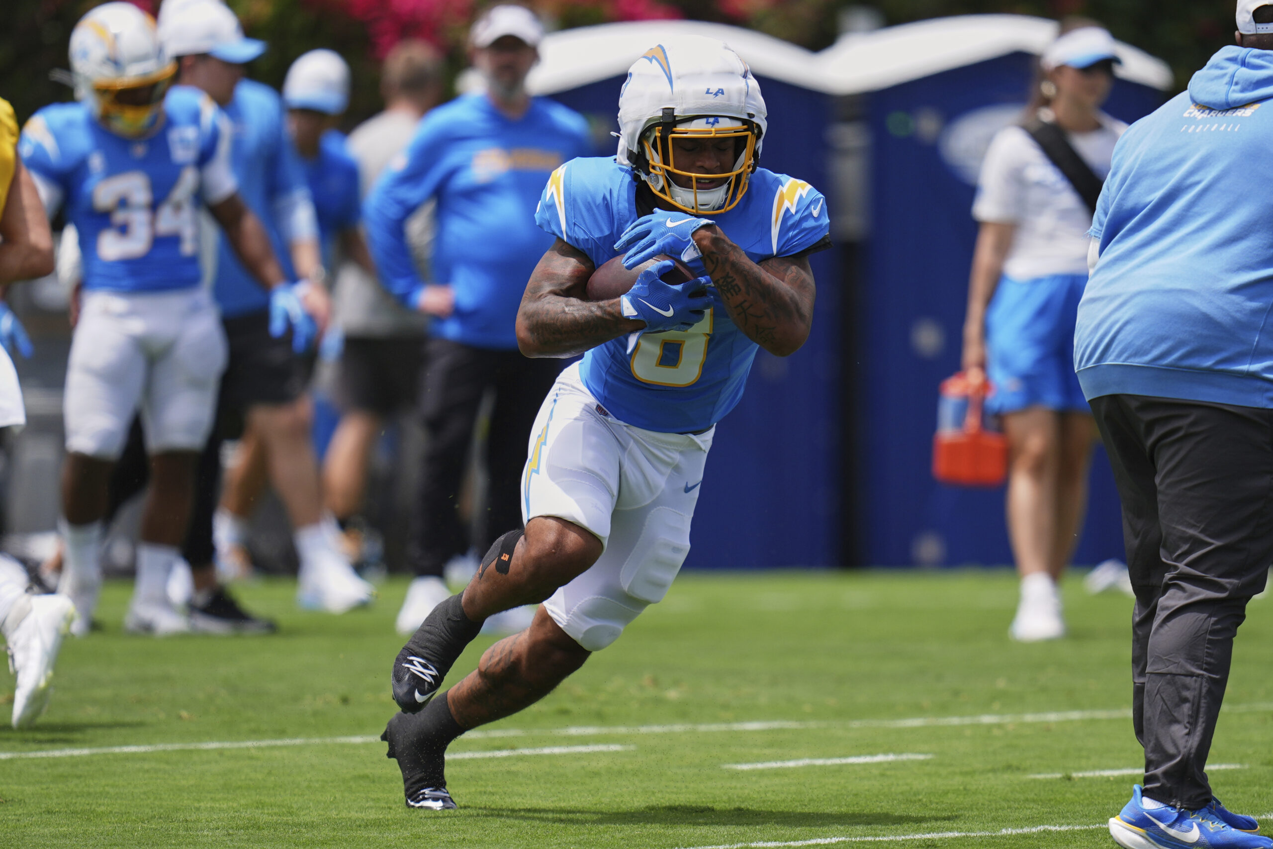Chargers rookie running back Omarion Hampton goes through a drill...