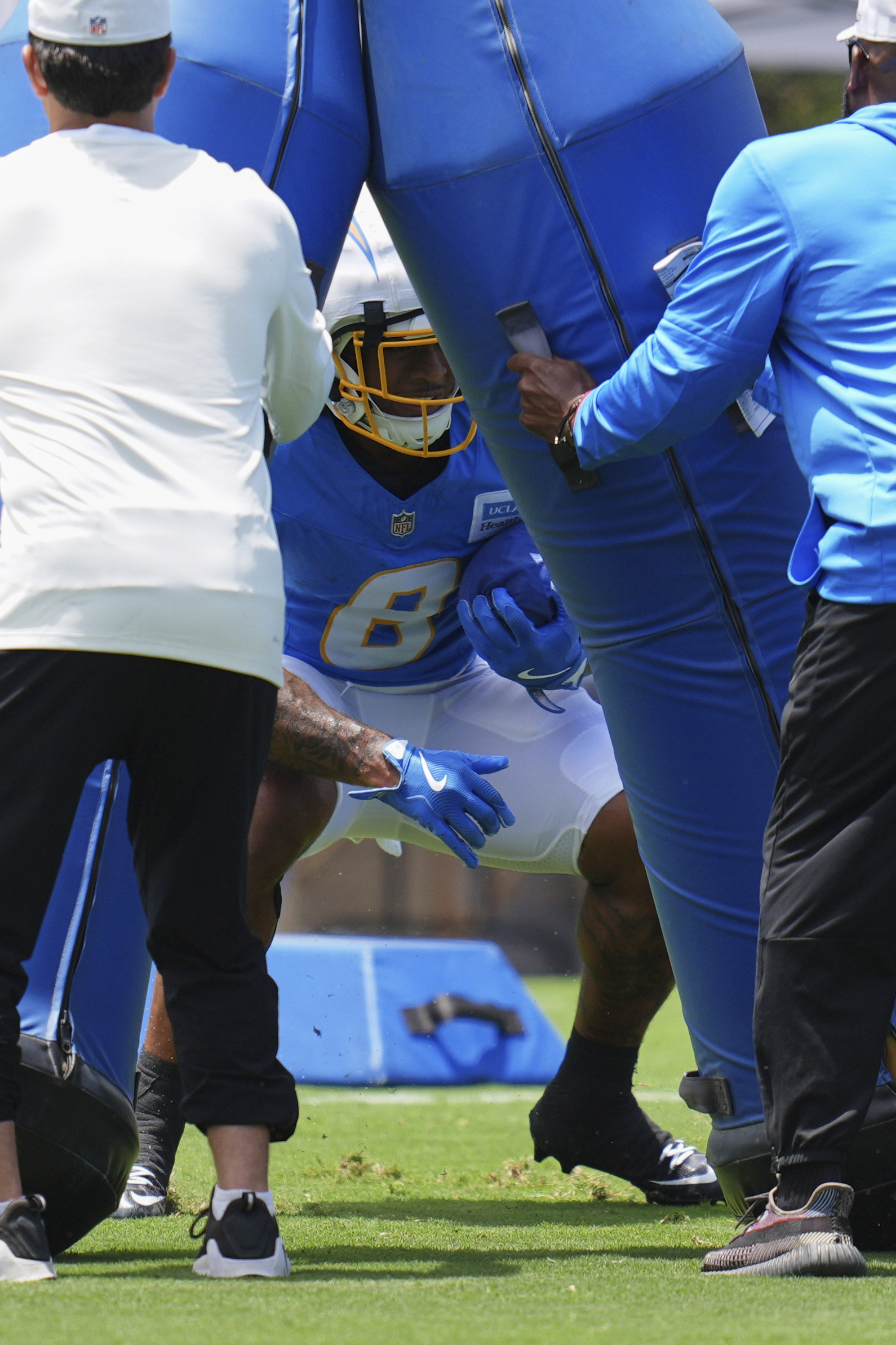 Chargers rookie running back Omarion Hampton goes through a drill...