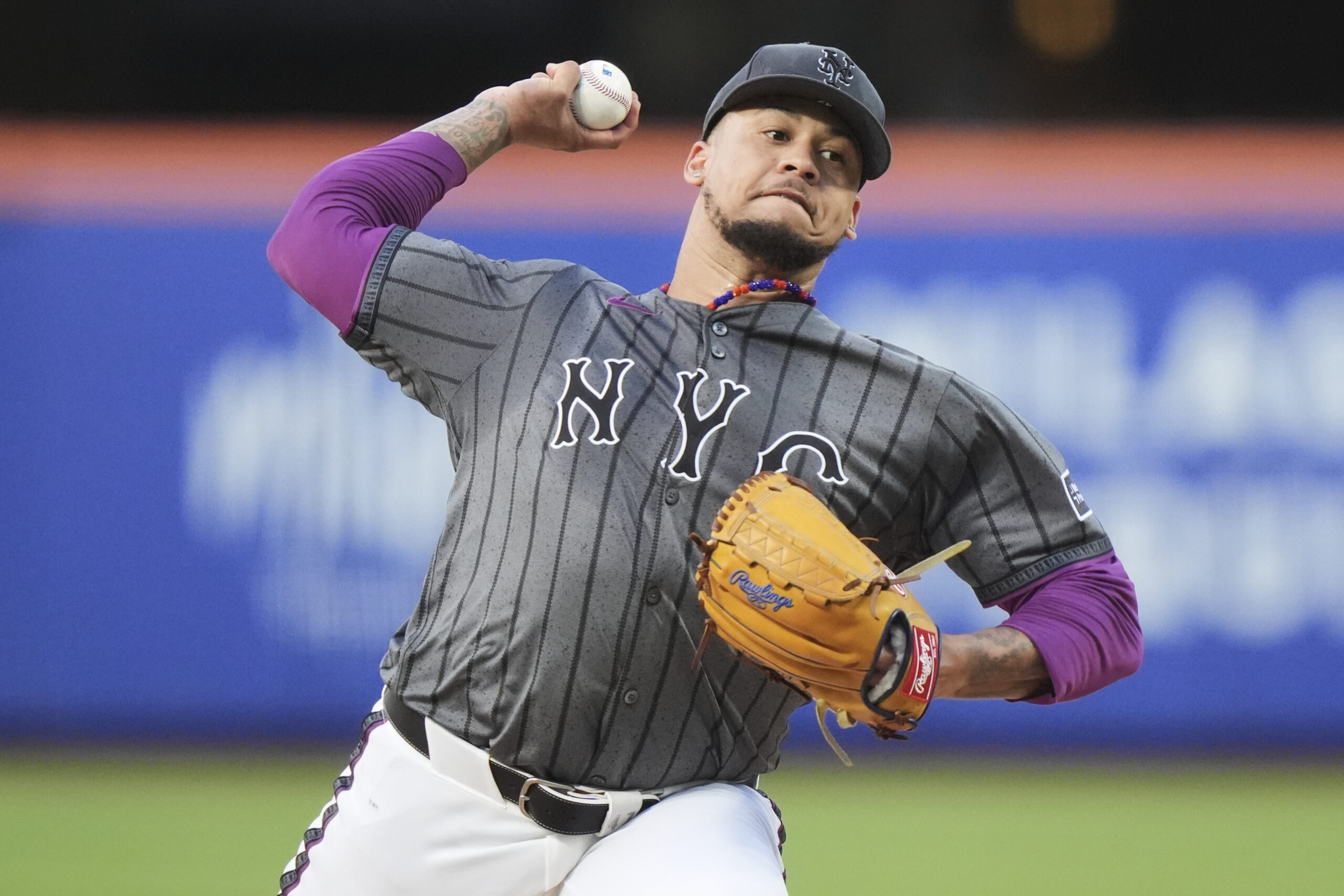 New York Mets starting pitcher Frankie Montas throws to the...