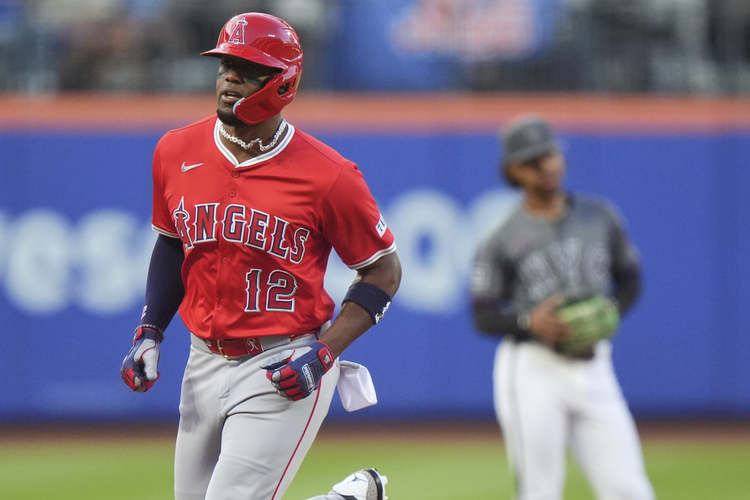 The Angels’ Jorge Soler runs the bases after hitting a...