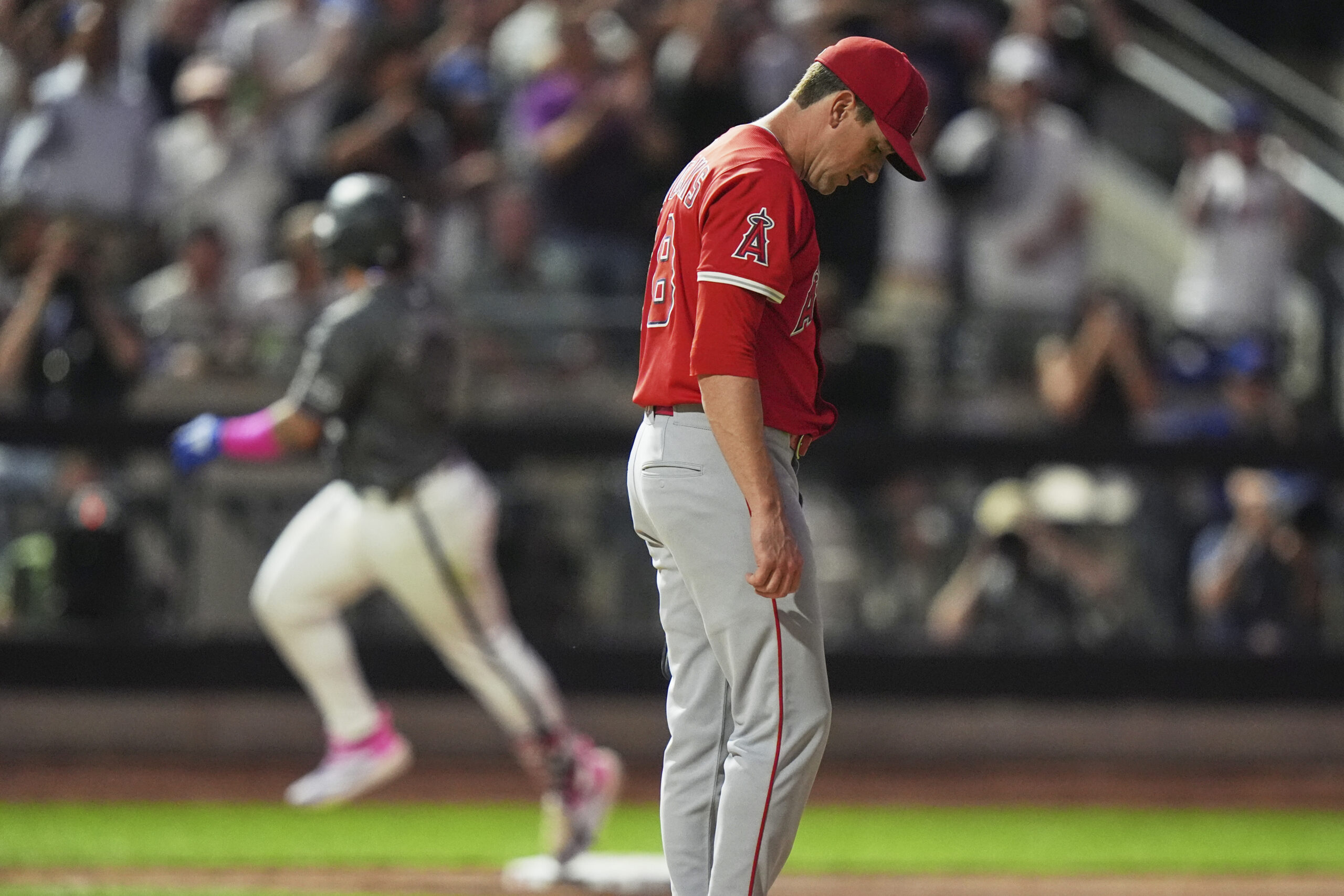 Angels starting pitcher Kyle Hendricks shows his frustration as the...