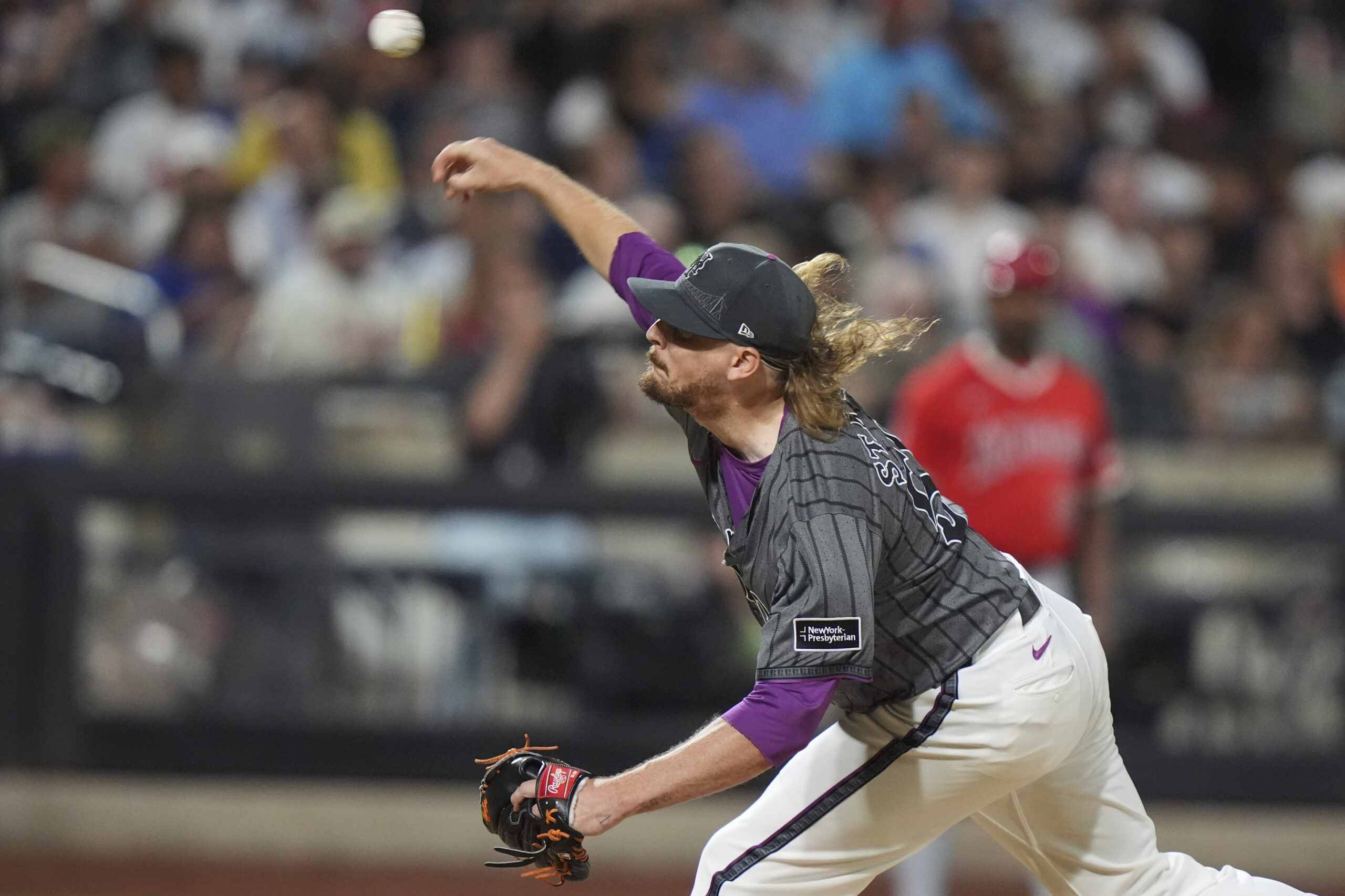 New York Mets relief pitcher Ryne Stanek throws to the...