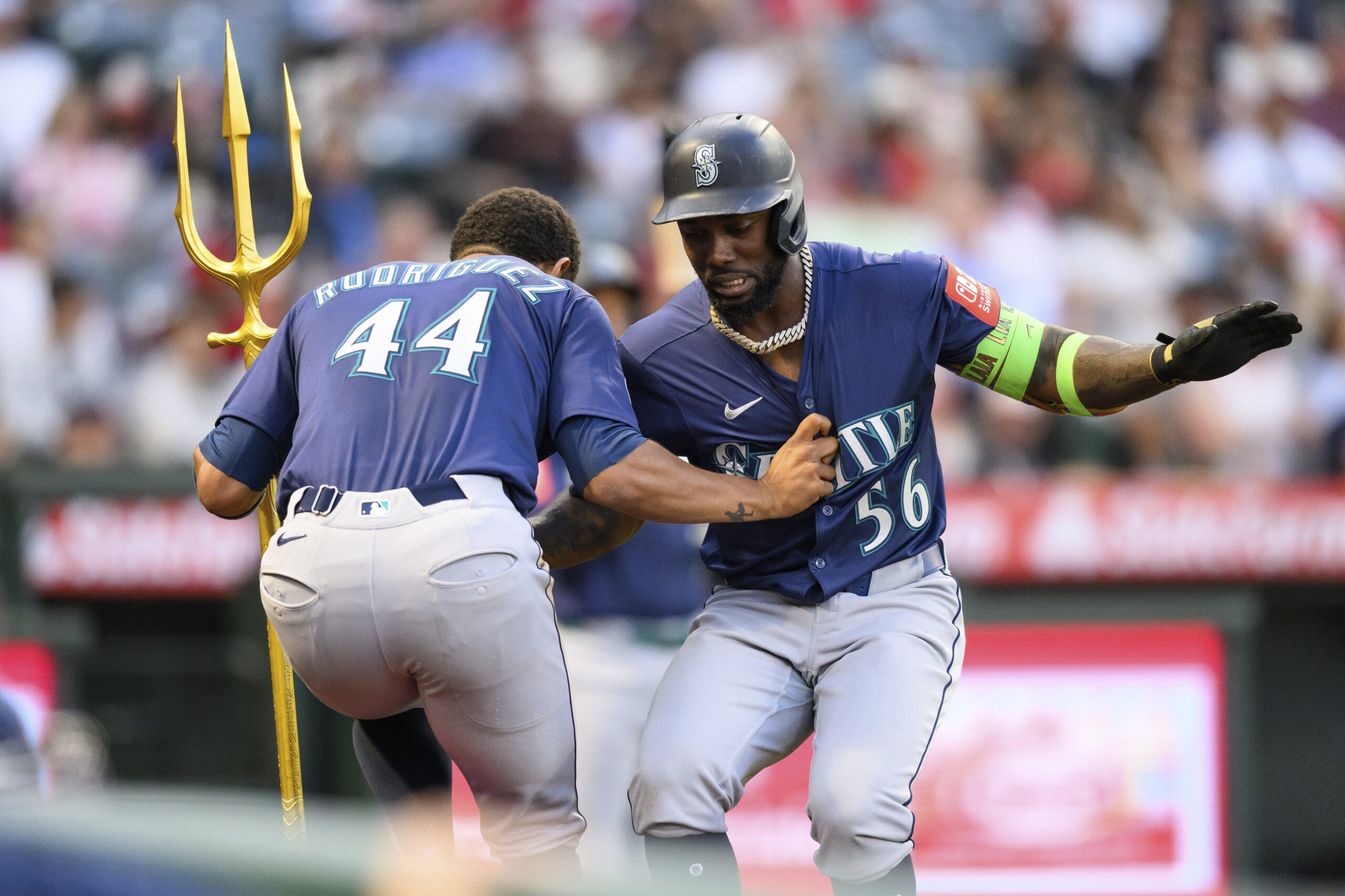 Seattle Mariners’ Randy Arozarena, right, celebrates with Julio Rodríguez, left,...