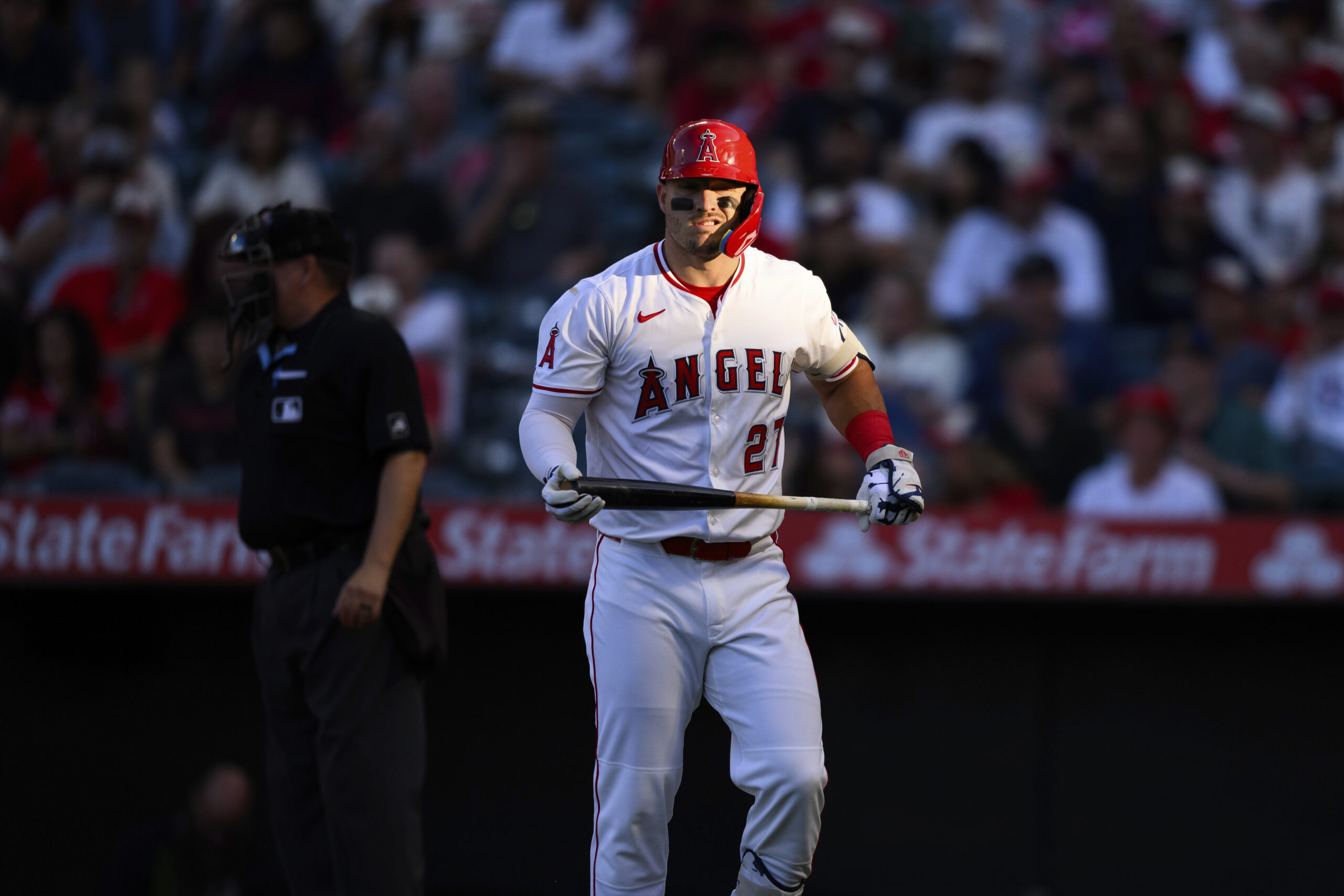 Angels Mike Trout reacts after striking out during the first...