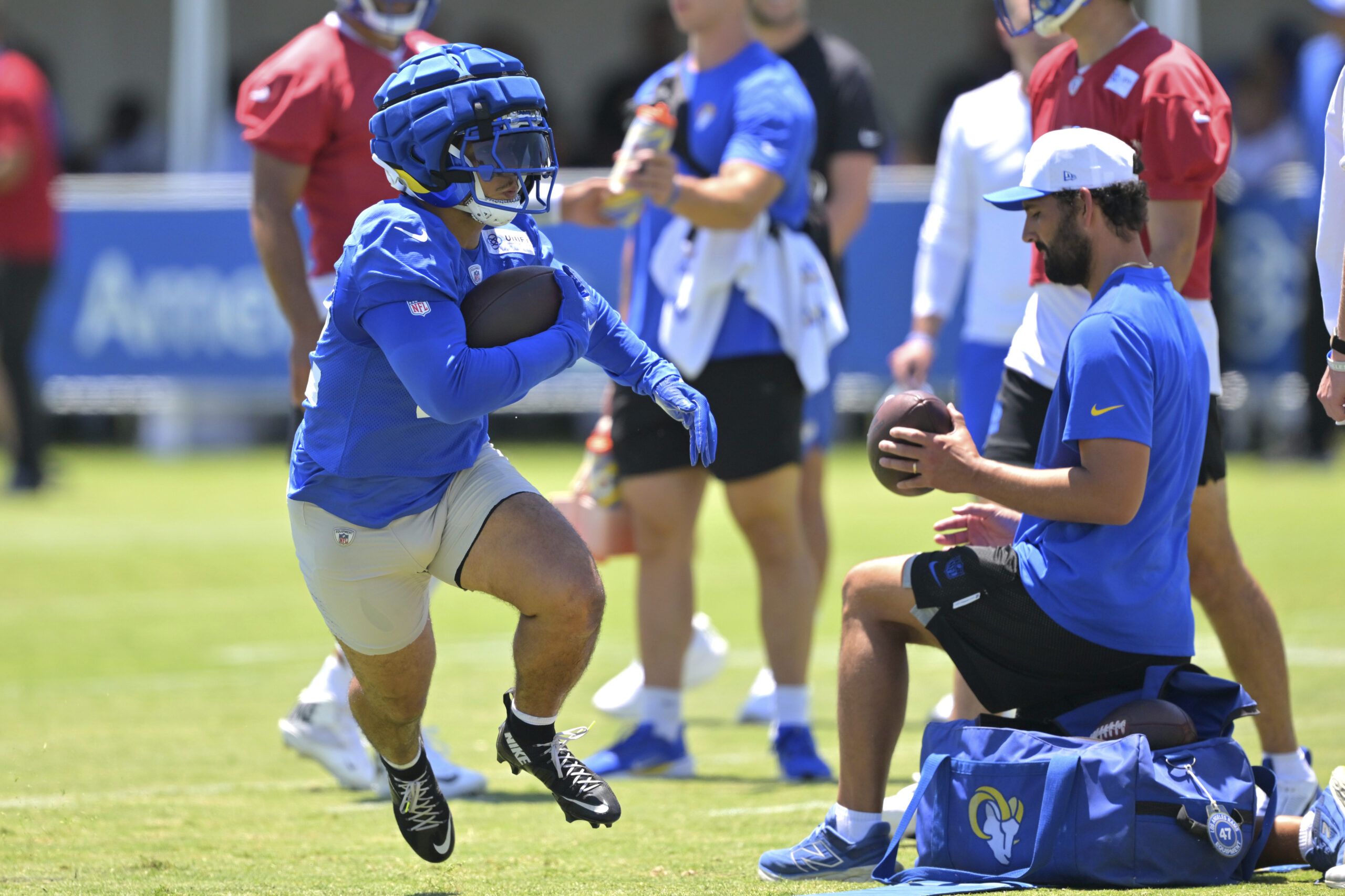 Rams running back Blake Corum participates in drills during a...
