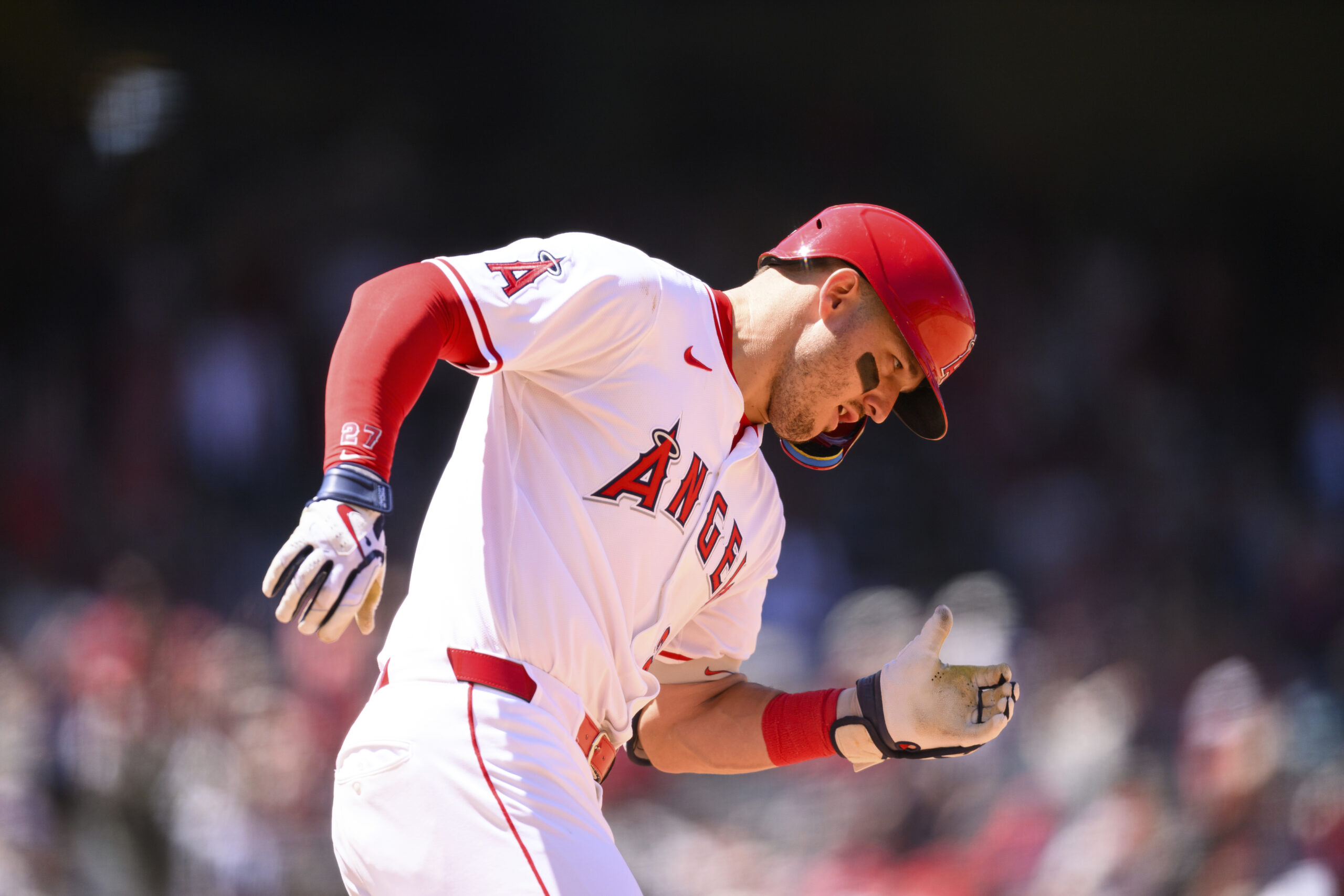 Angels’ Mike Trout runs after hitting a home run during...
