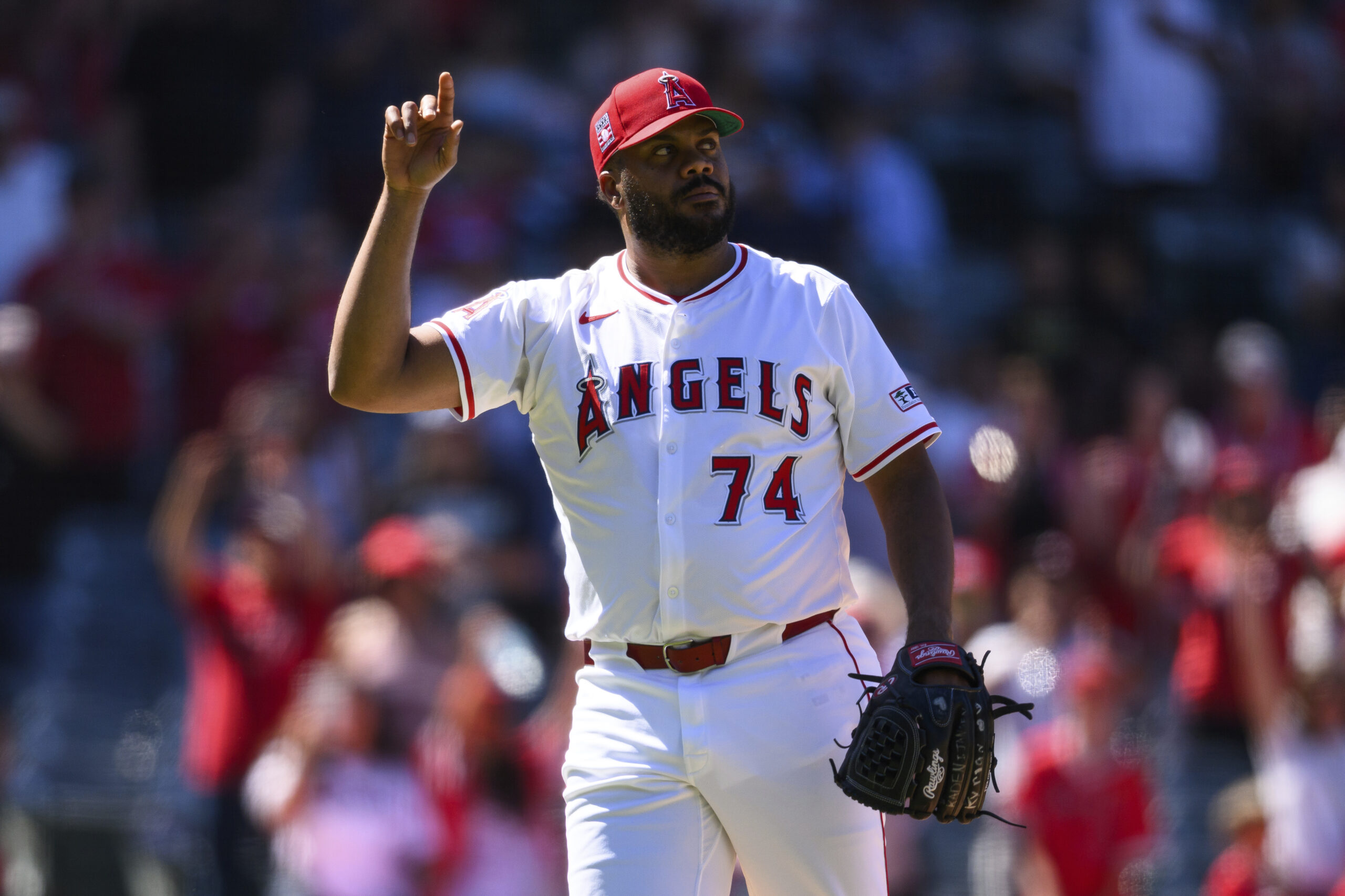 Angels pitcher Kenley Jansen gestures after closing out the ninth...