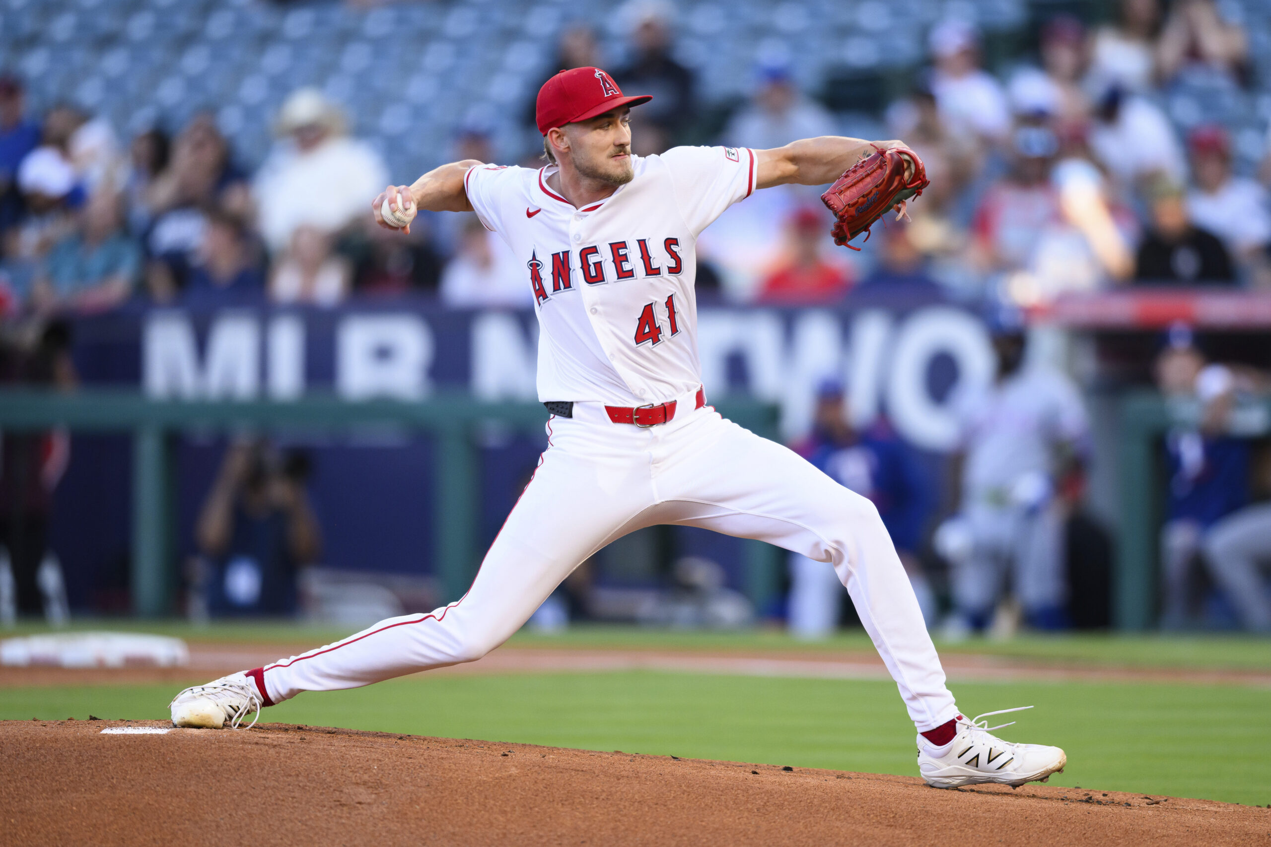 Angels starting pitcher Jack Kochanowicz throws to the plate during...