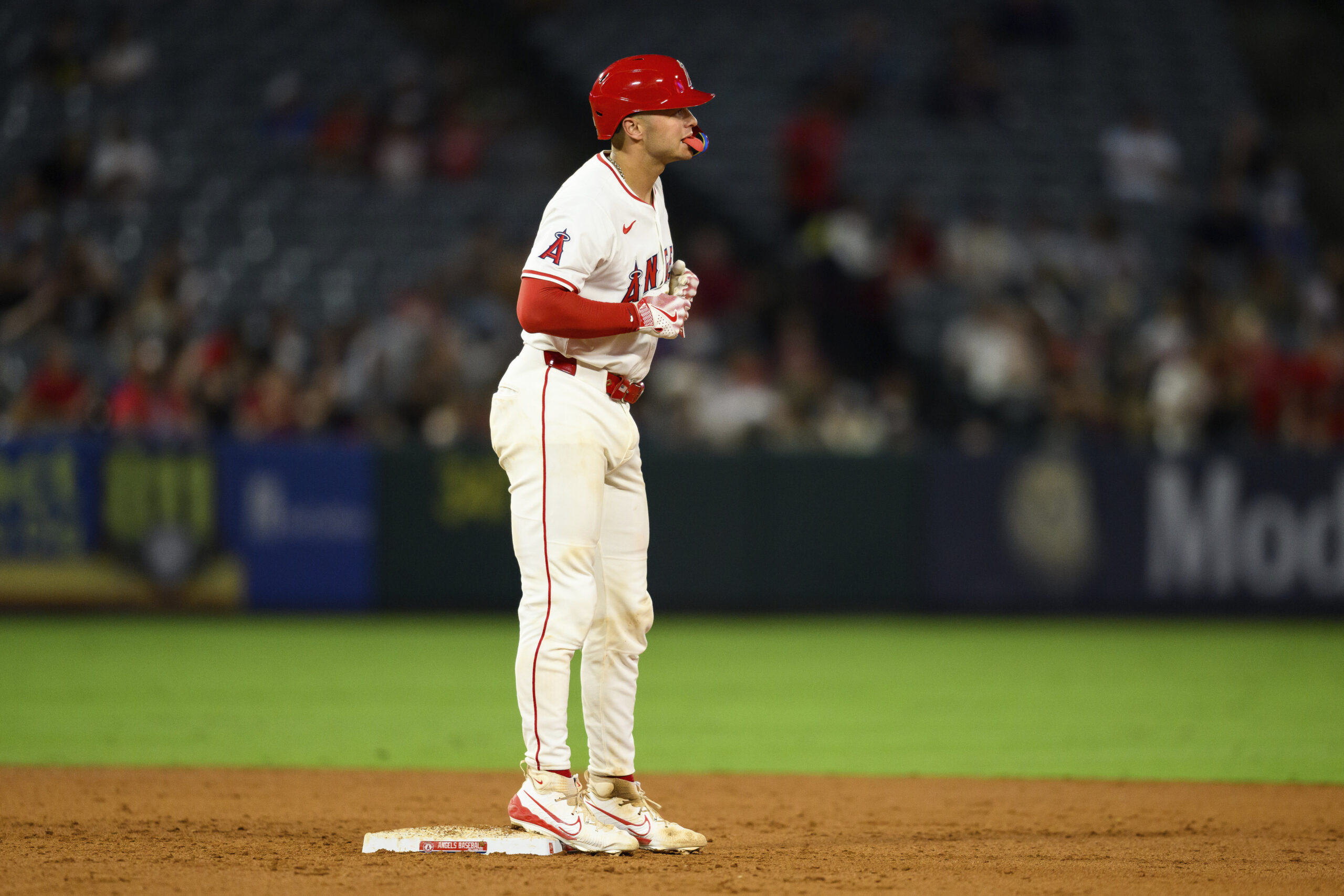 The Angels’ Logan O’Hoppe stands on second base after hitting...