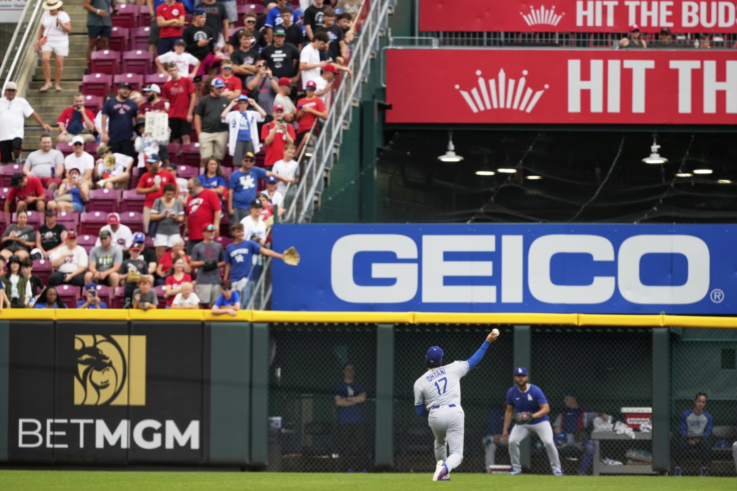 Dodgers starting pitcher Shohei Ohtani warms up before a baseball...