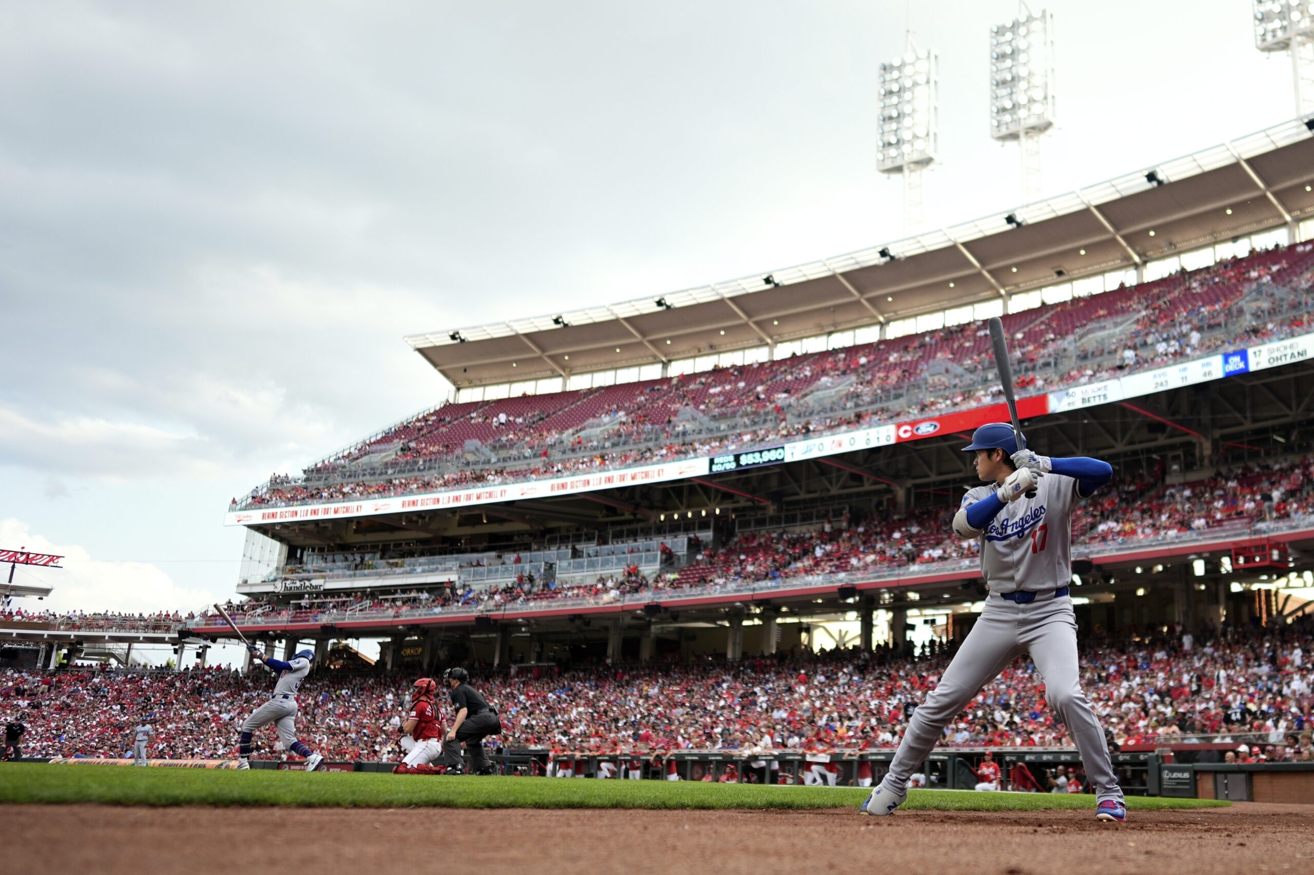 Dodgers star Shohei Ohtani waits to bat during the first...