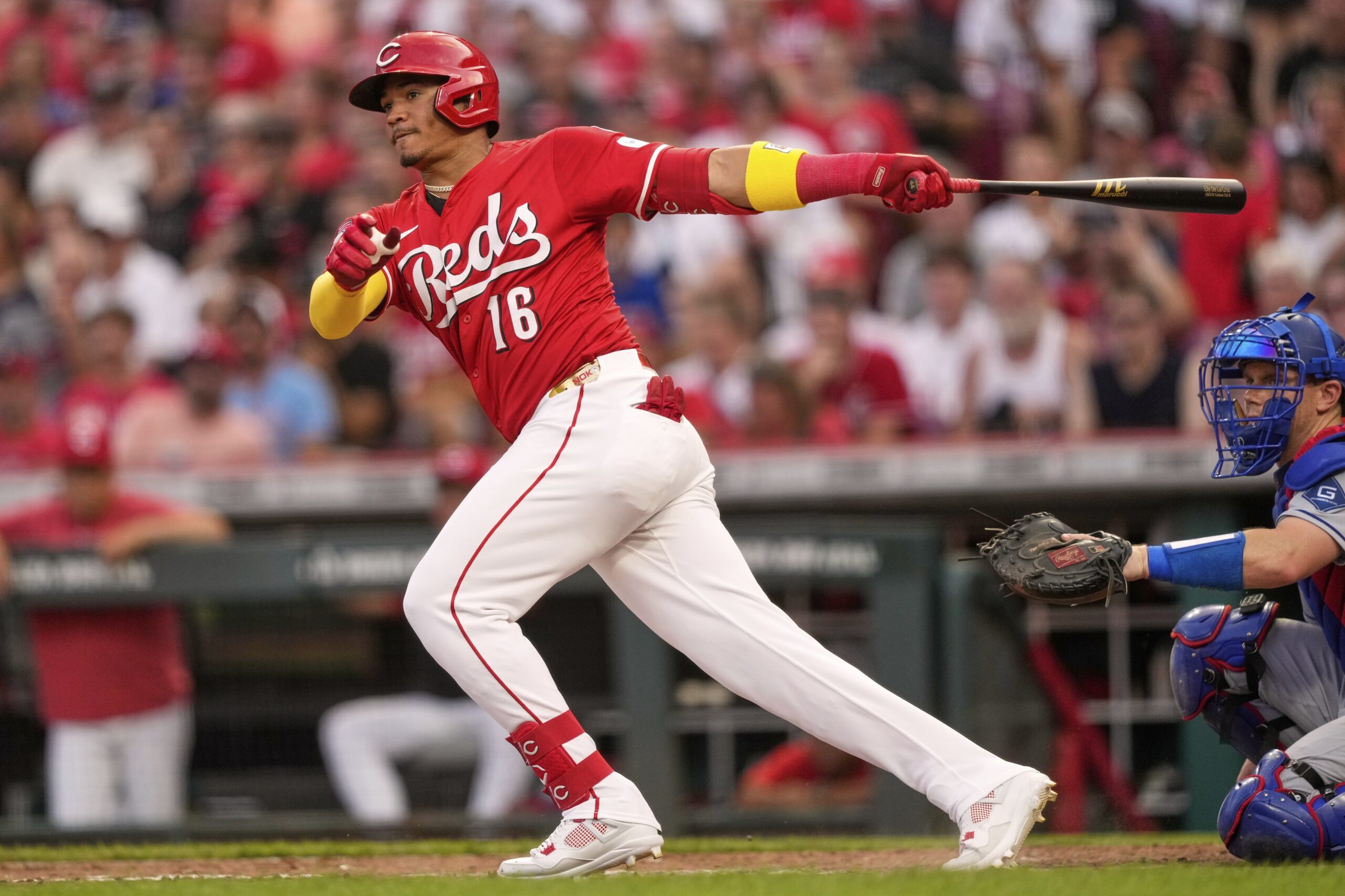 The Cincinnati Reds’ Noelvi Marte hits a single during the...