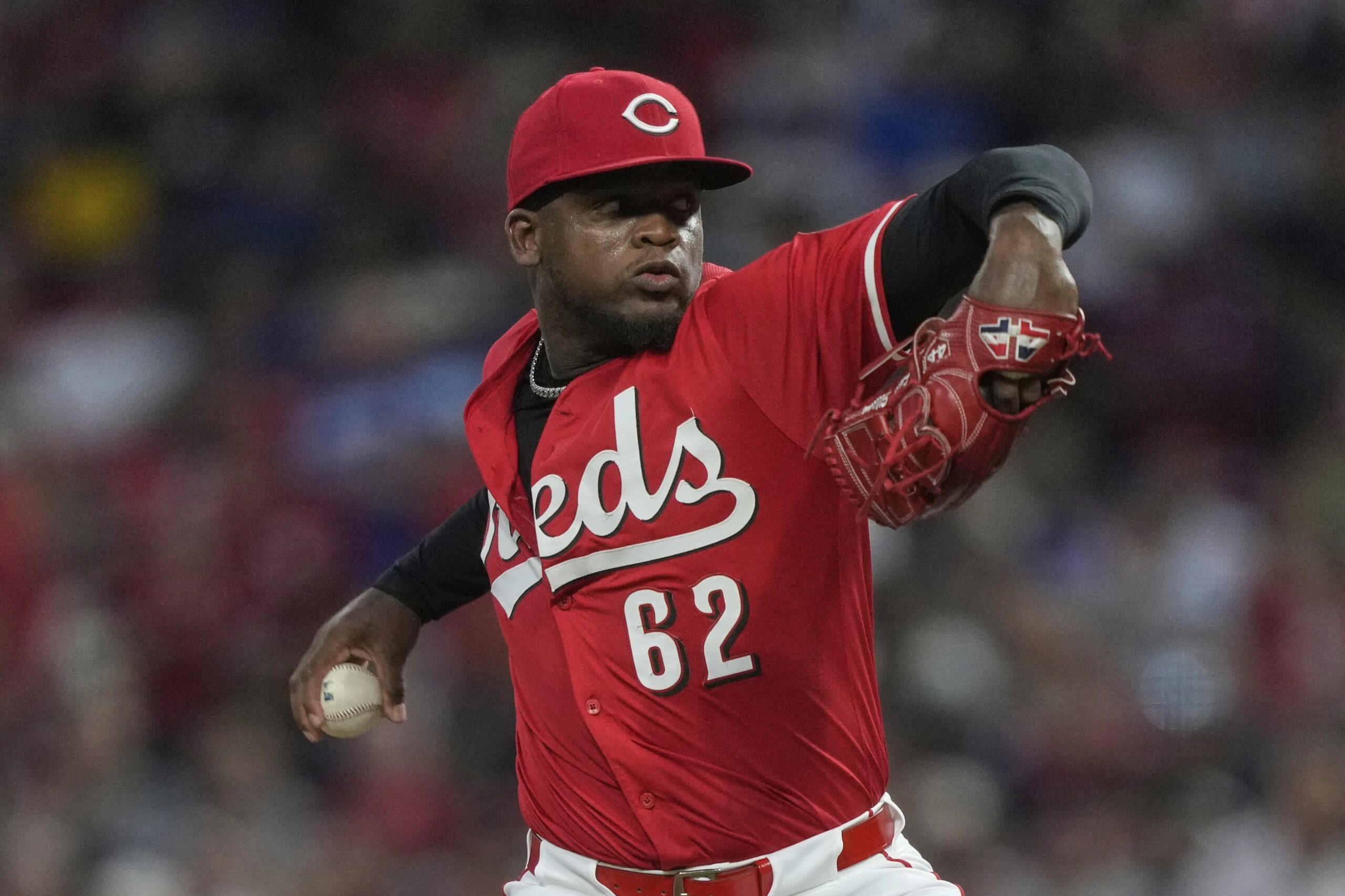 Cincinnati Reds relief pitcher Luis Mey throws to the plate...