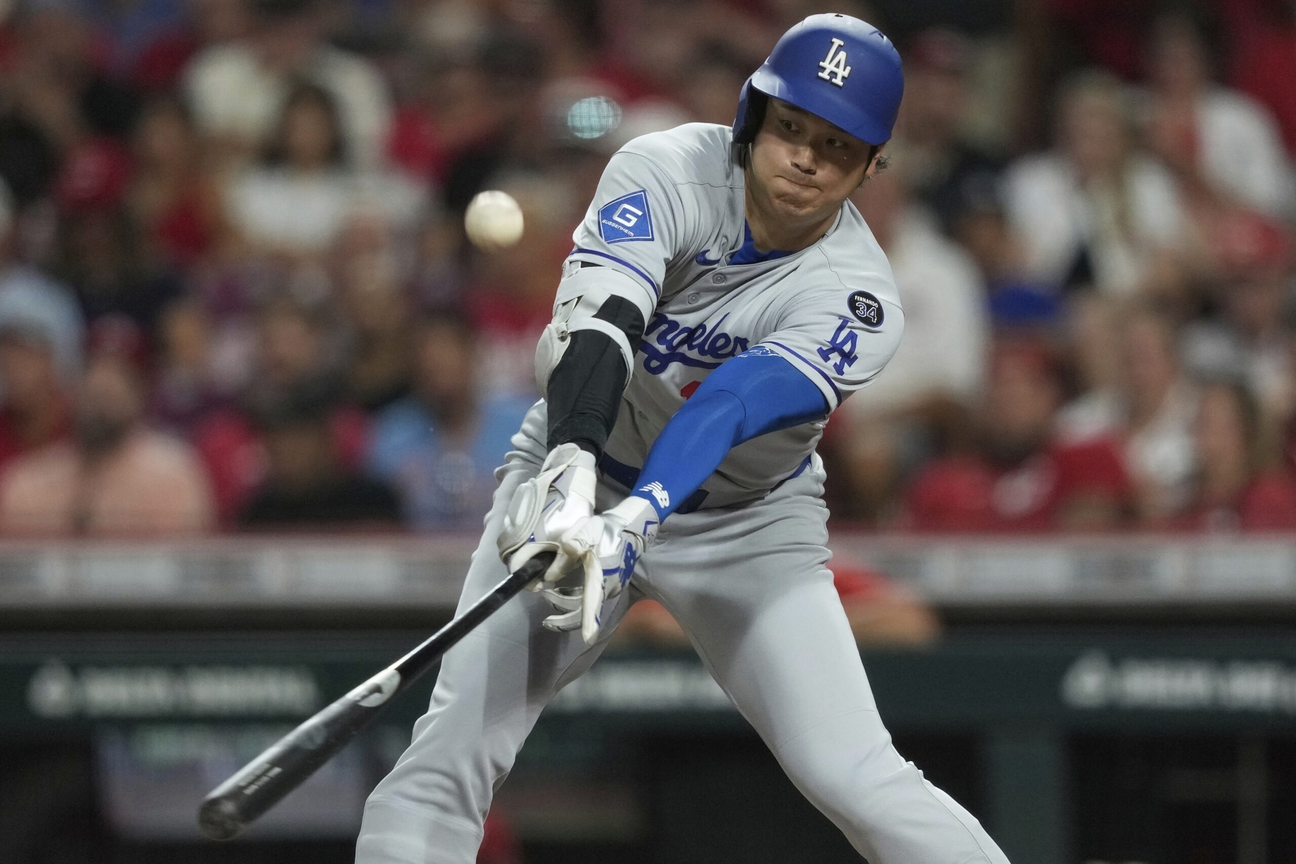 Dodgers star Shohei Ohtani flies out during the eighth inning...