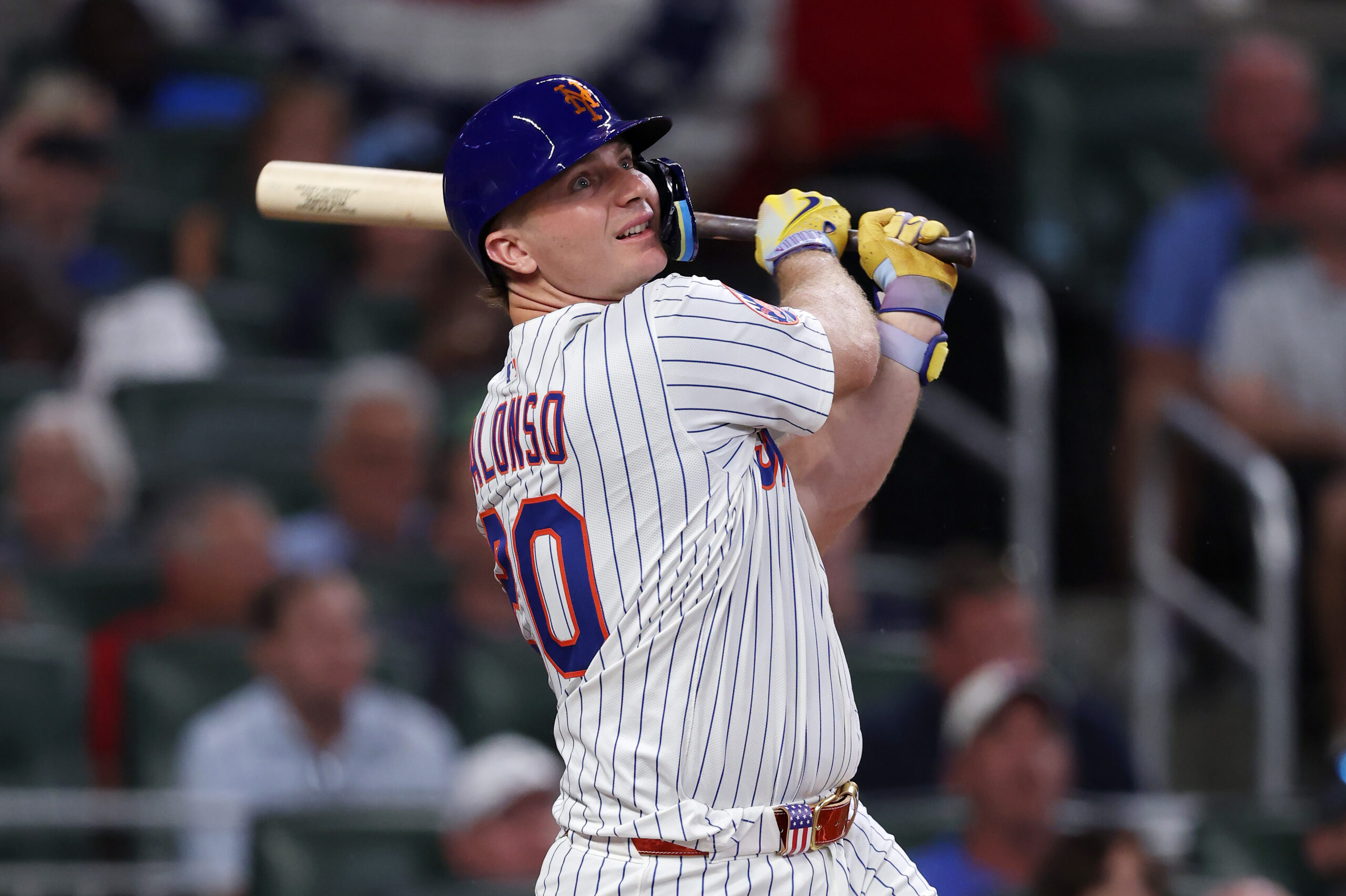 New York Mets slugger Pete Alonso hits a three-run home...