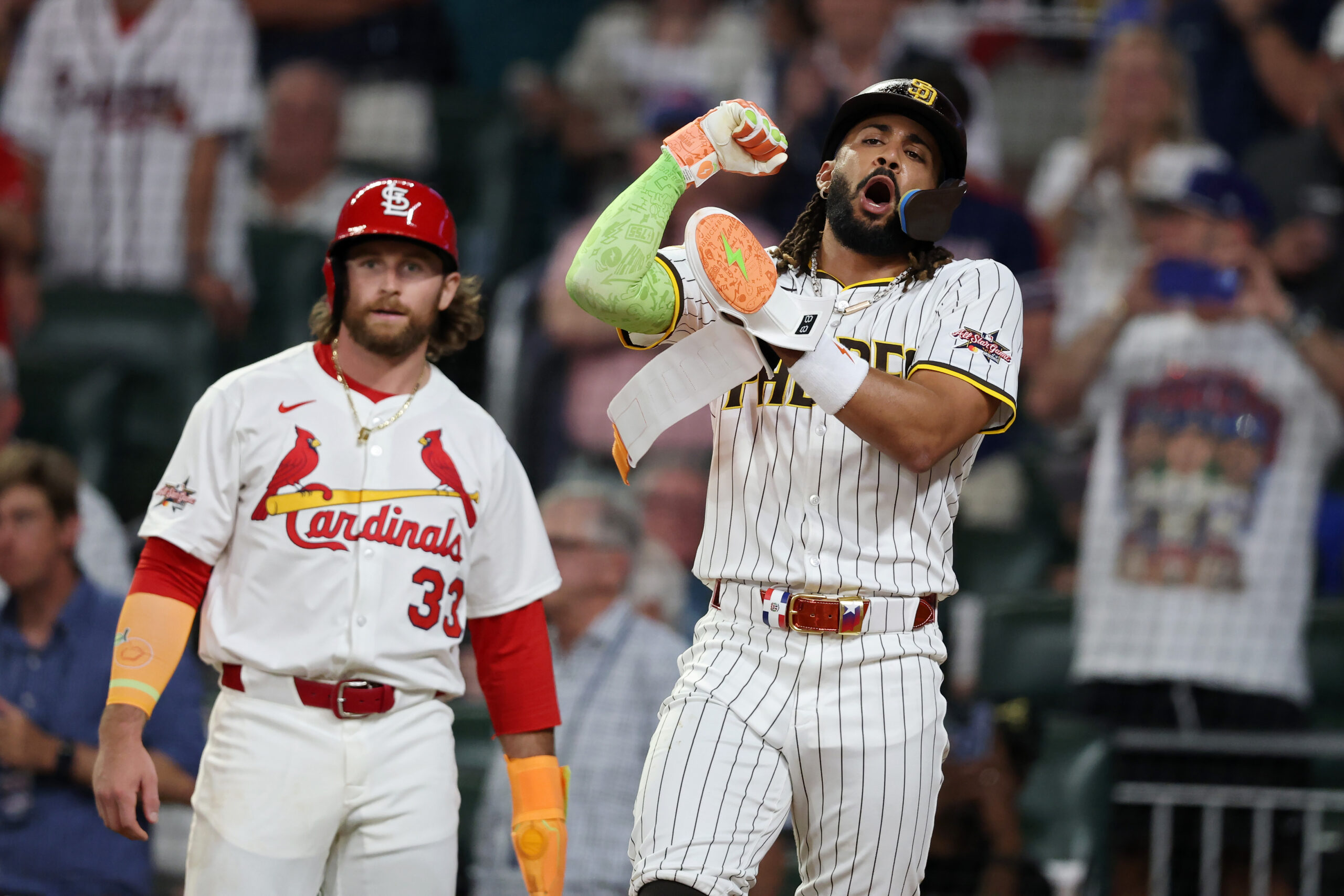 San Diego Padres star Fernando Tatis Jr., right, and the...