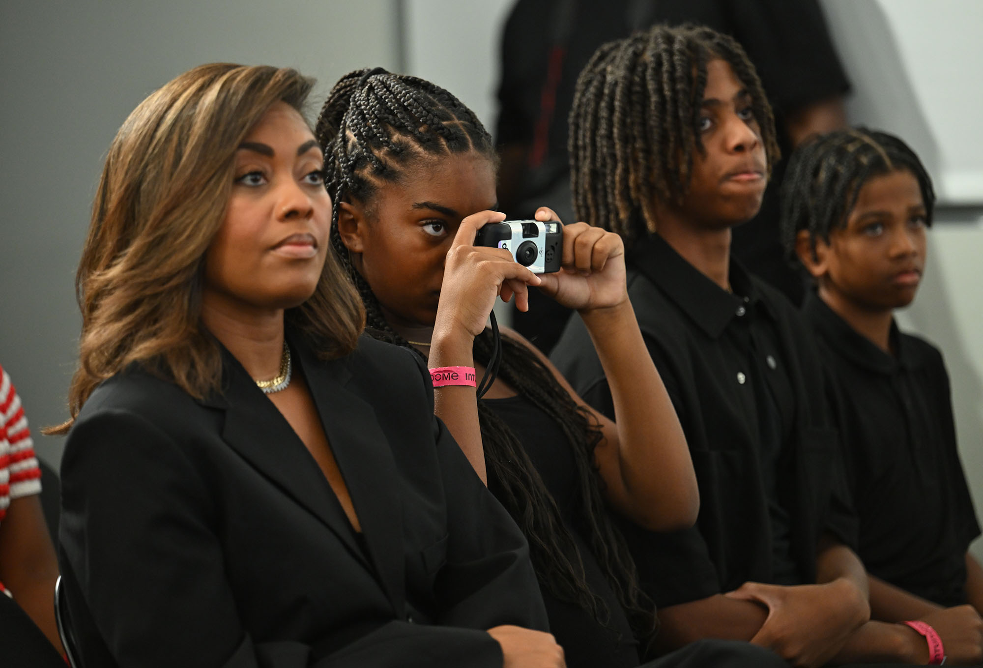 Chris Paul’s wife, Jada, left, looks on during a press...