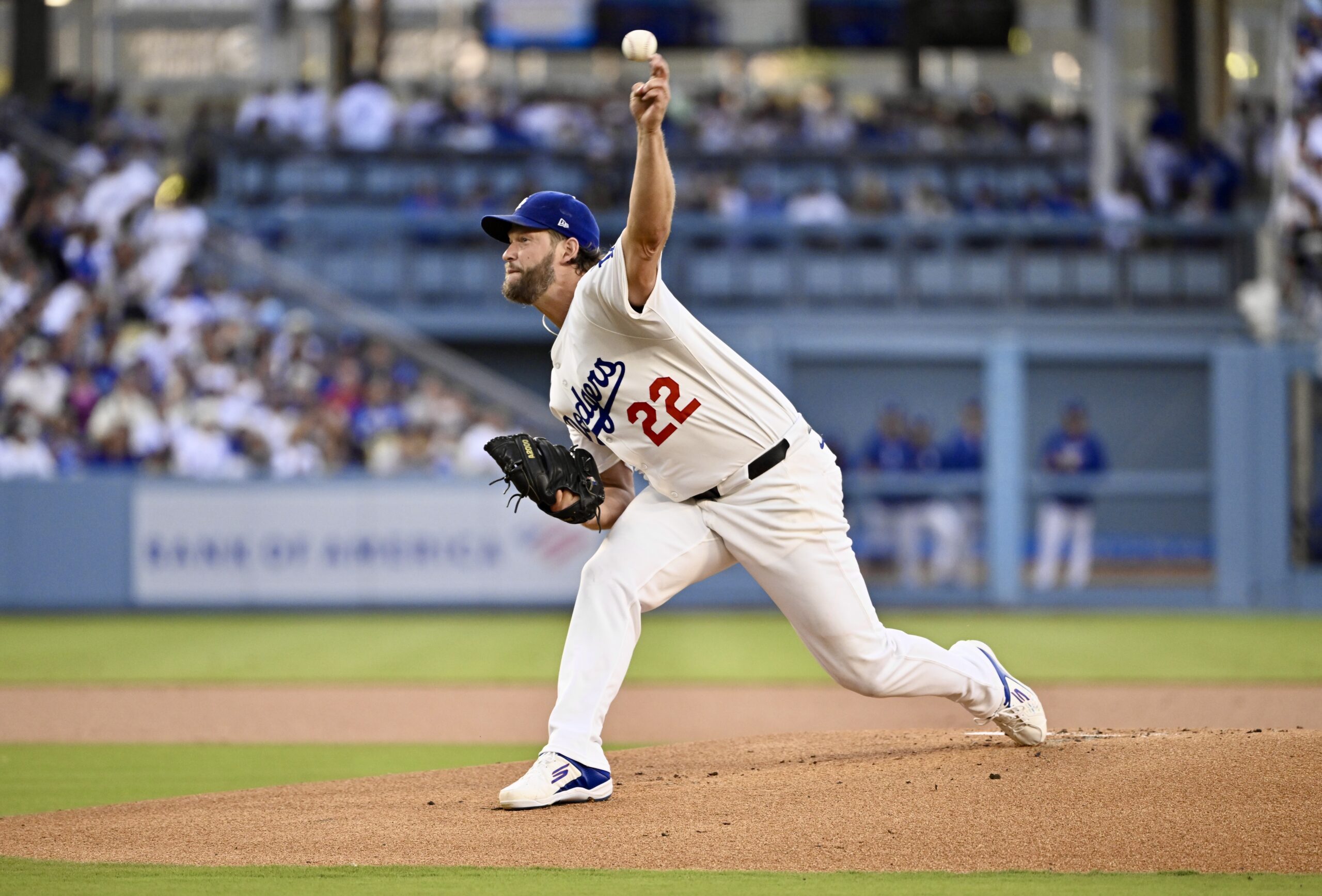 Dodgers starting pitcher Clayton Kershaw throws to the plate during...