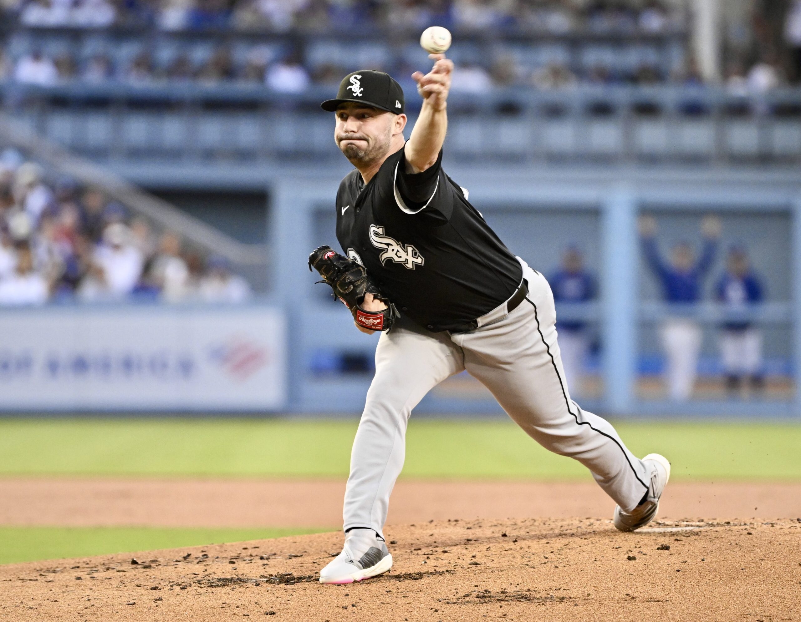 Chicago White Sox starting pitcher Brandon Eisert throws to the...