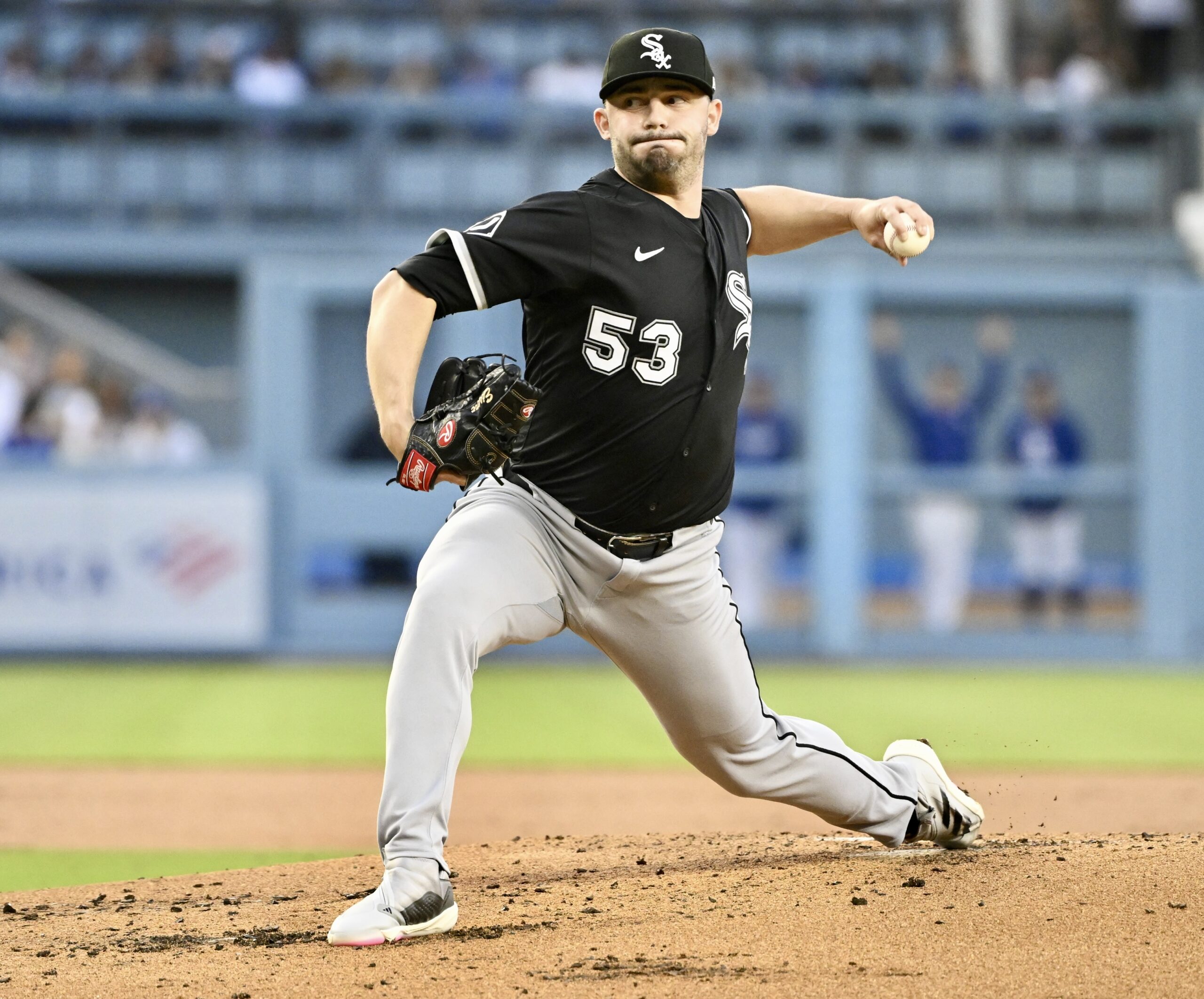Chicago White Sox starting pitcher Brandon Eisert throws to the...