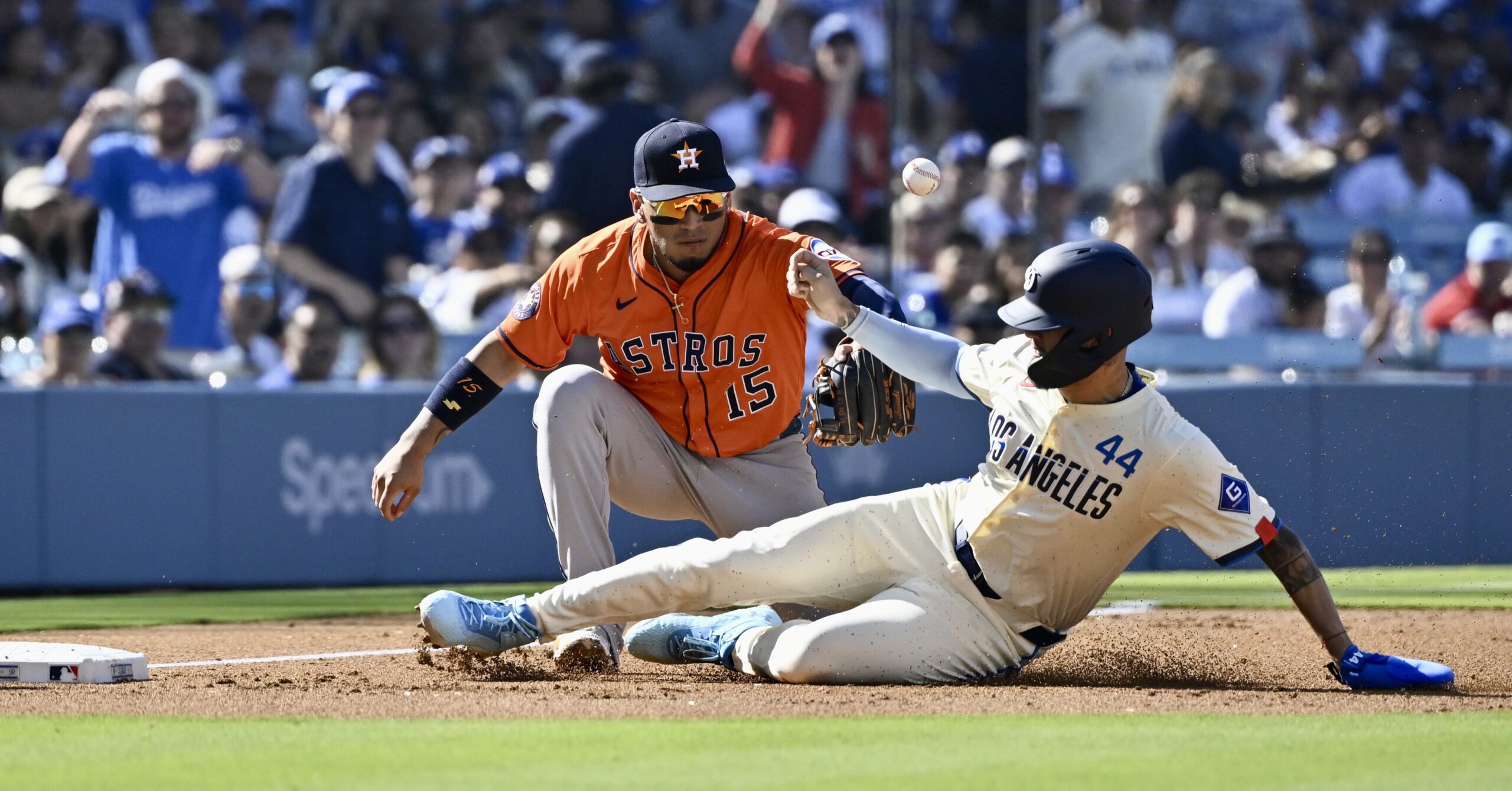 Andy Pages #44 of the Dodgers safe at third as...