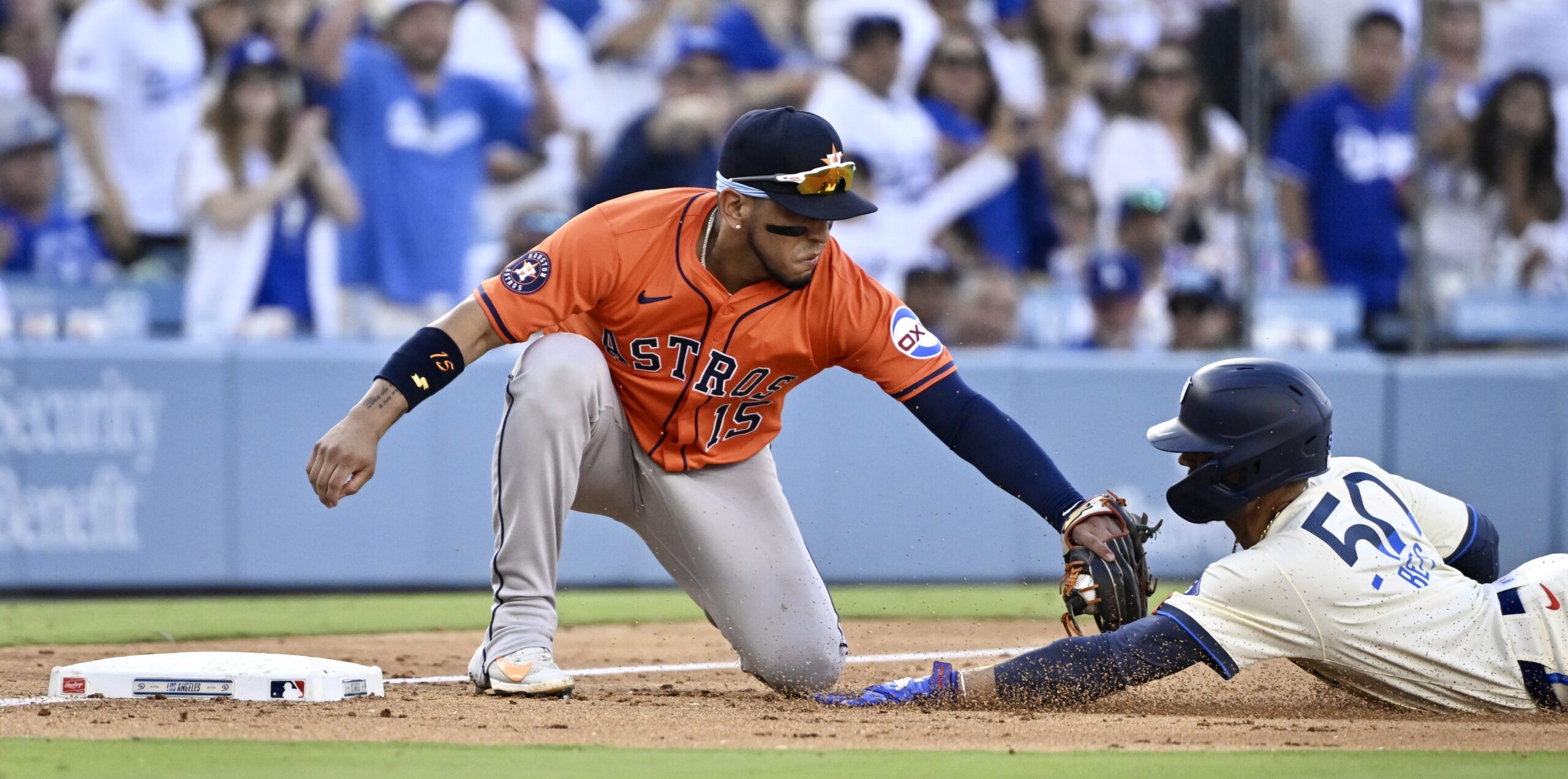 Third baseman Isaac Paredes #15 of the Houston Astros tags...