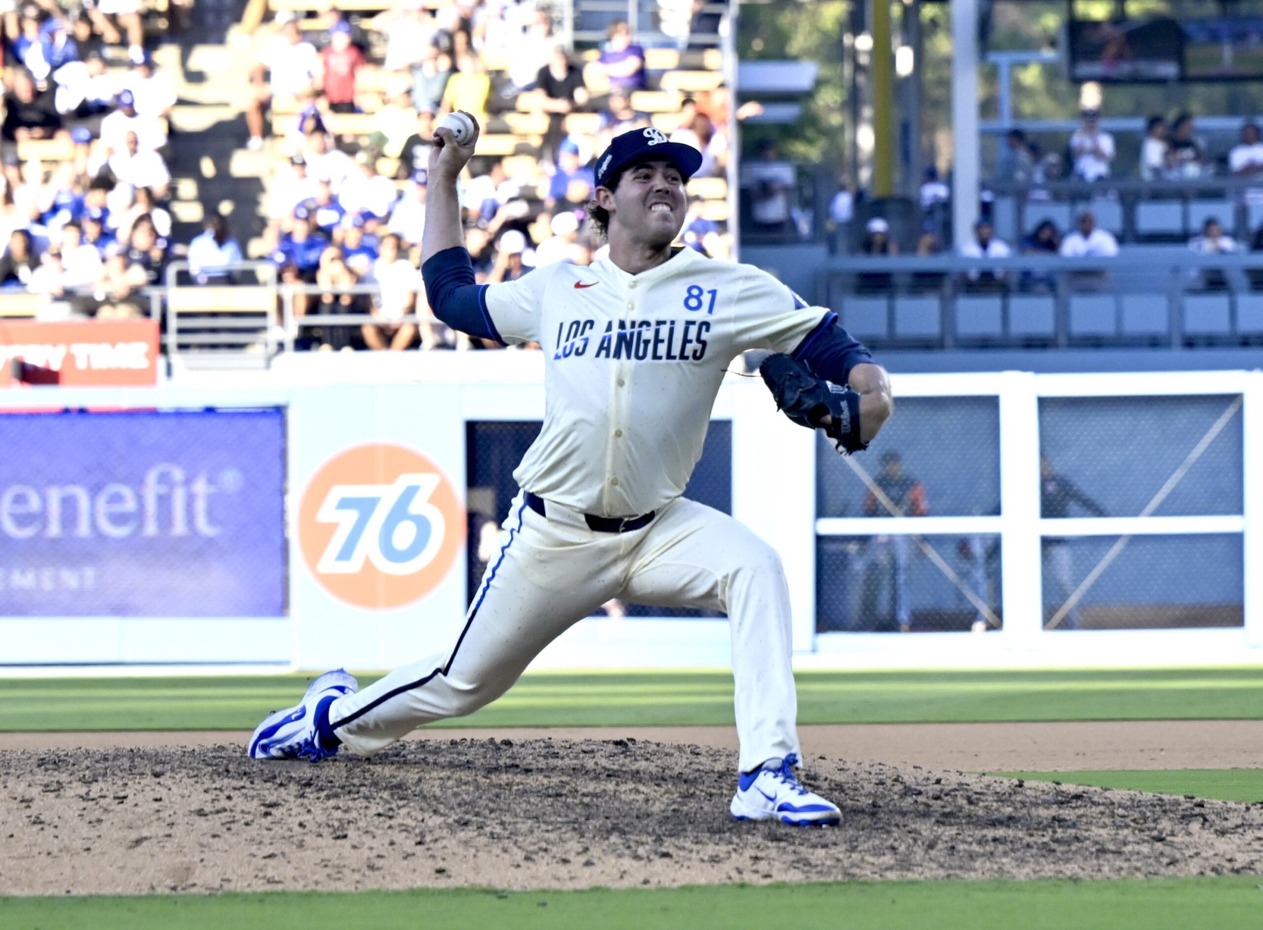 Relief pitcher Jack Little #81 of the Dodgers throws to...